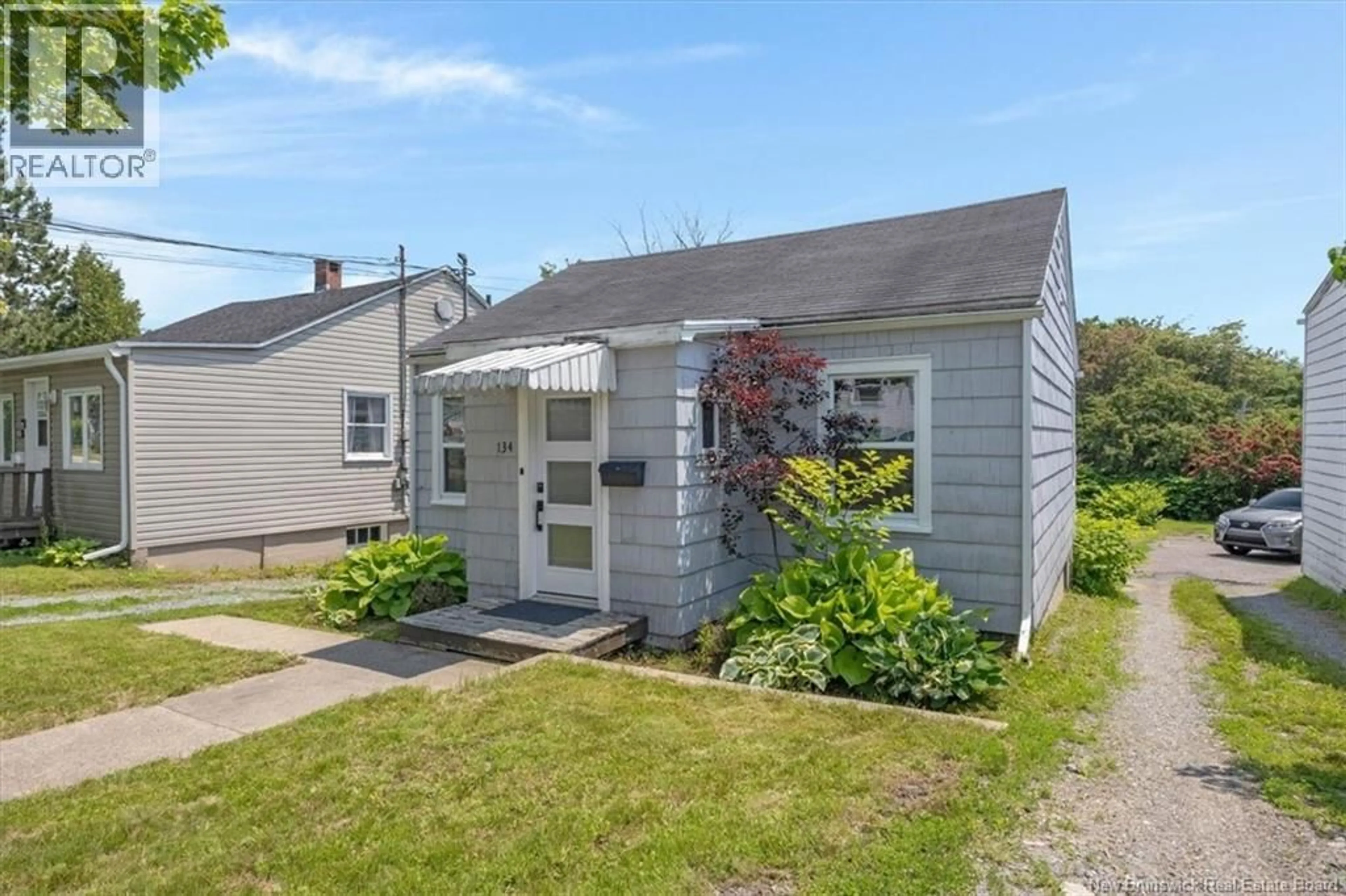 Home with vinyl exterior material, street for 134 COURTENAY AVENUE, Saint John New Brunswick E2J1N5