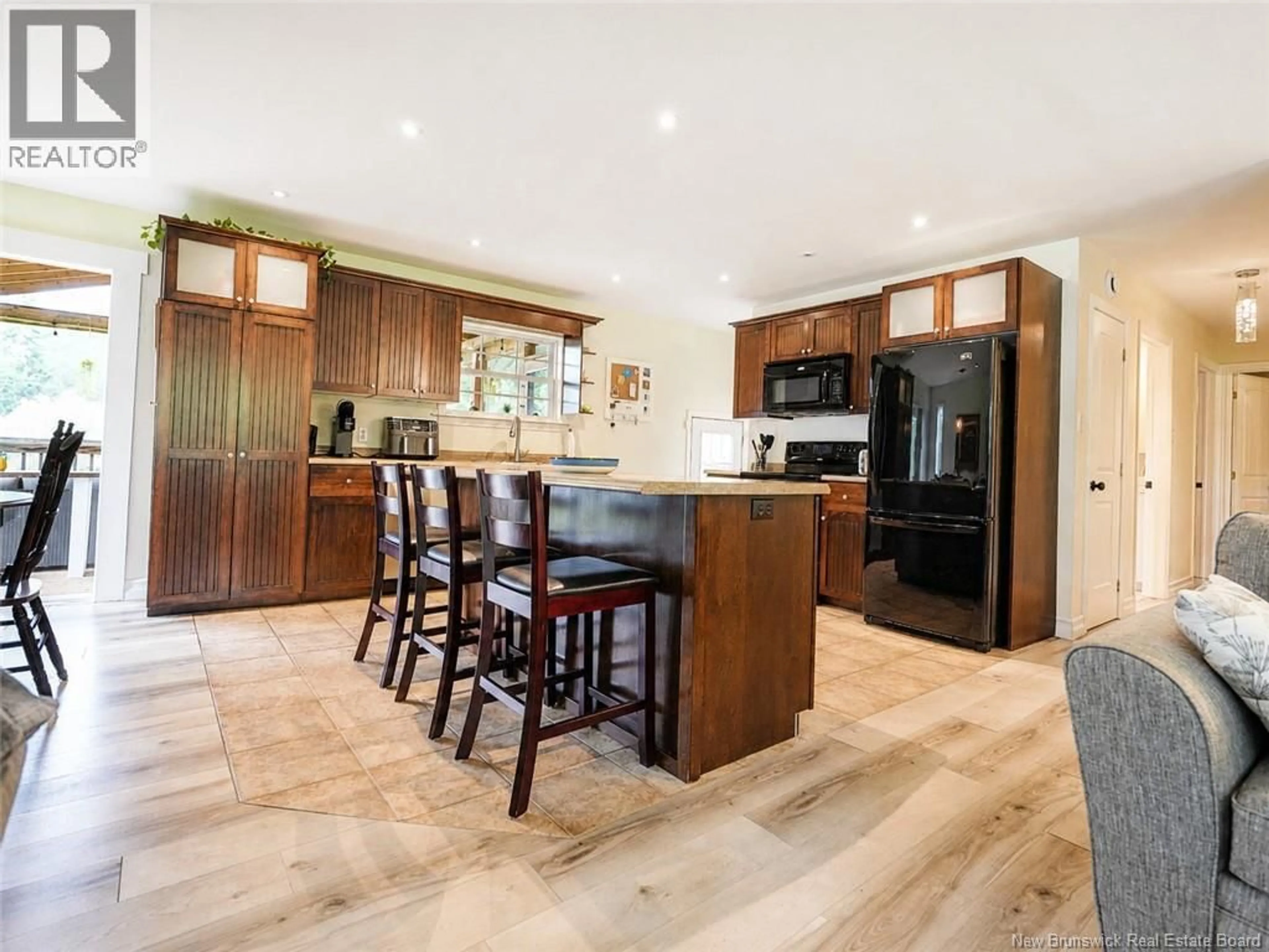 Open concept kitchen, wood/laminate floor for 1745 ROUTE 112, Upper Coverdale New Brunswick E1J1Y2