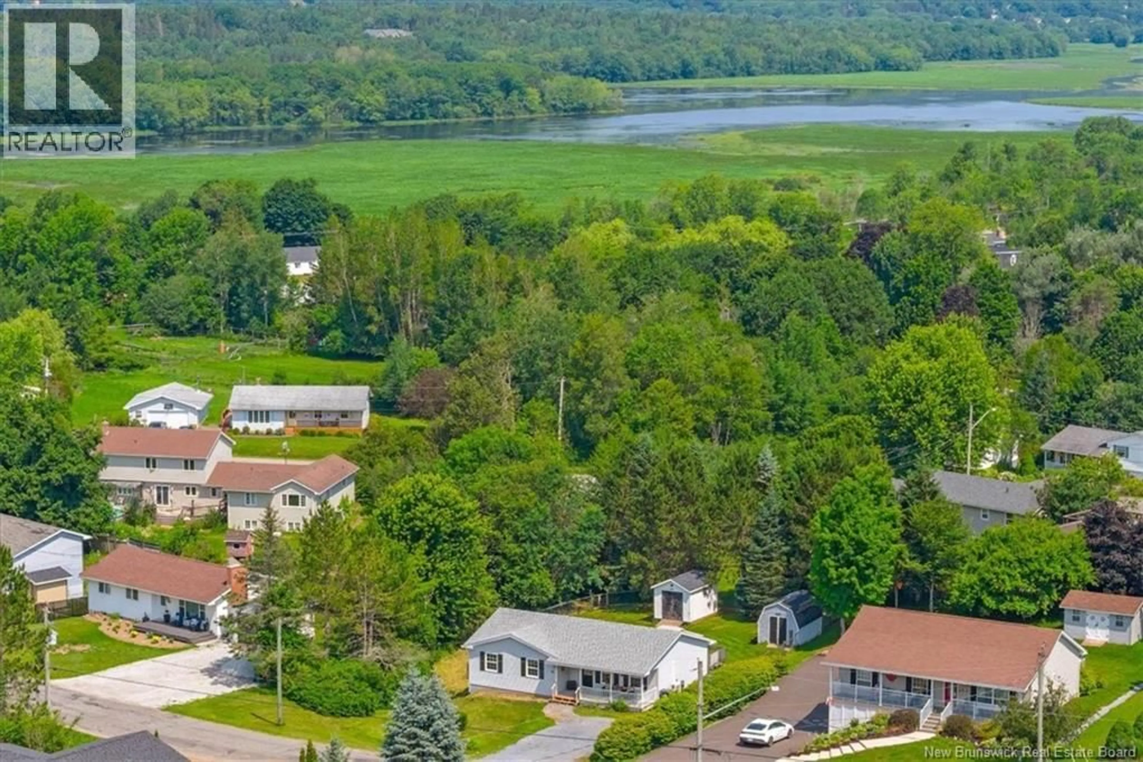 A pic from outside/outdoor area/front of a property/back of a property/a pic from drone, water/lake/river/ocean view for 77 LAW AVENUE, Hampton New Brunswick E5N5C2
