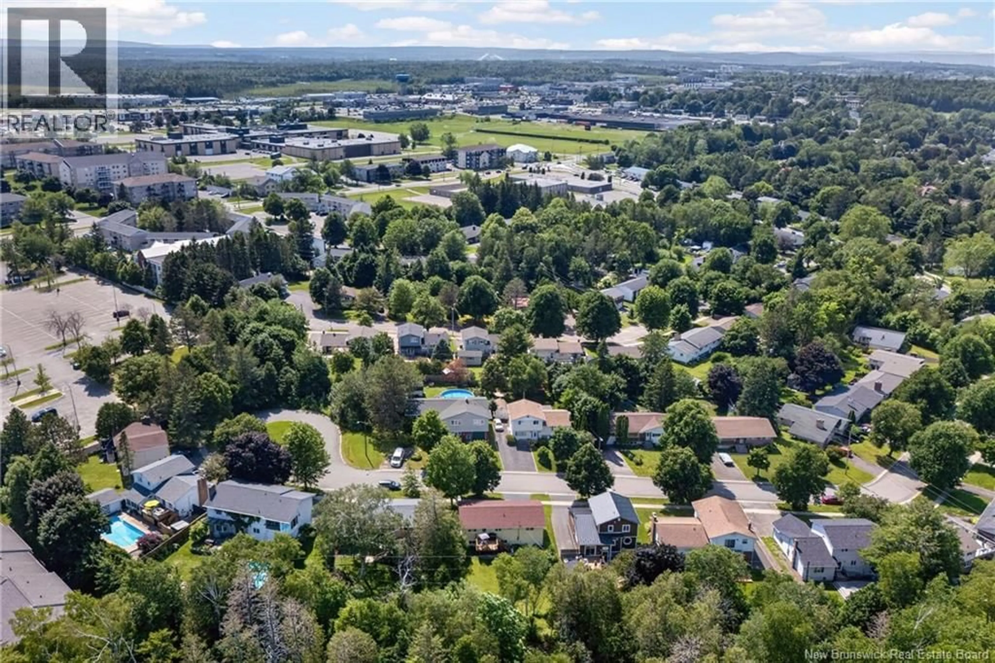 A pic from outside/outdoor area/front of a property/back of a property/a pic from drone, unknown for 495 MANSFIELD STREET, Fredericton New Brunswick E3B3A1