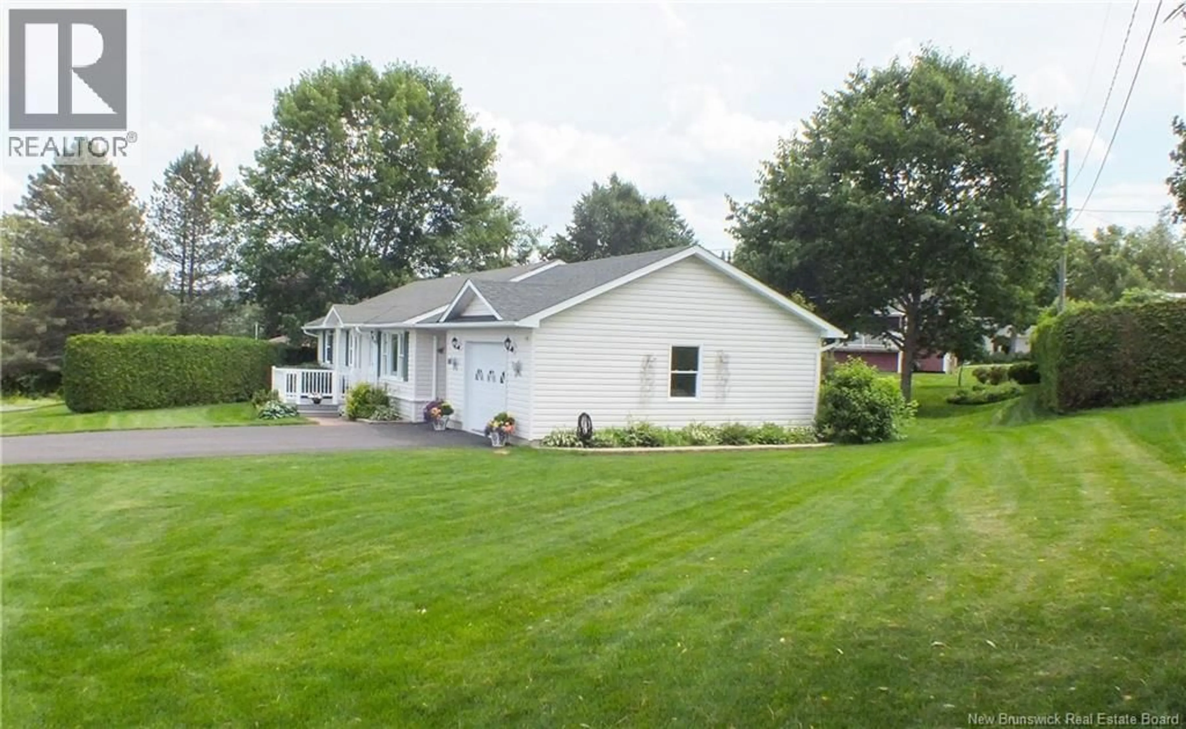 Home with vinyl exterior material, street for 111 BICENTENNIAL DRIVE, Woodstock New Brunswick E7M6A8