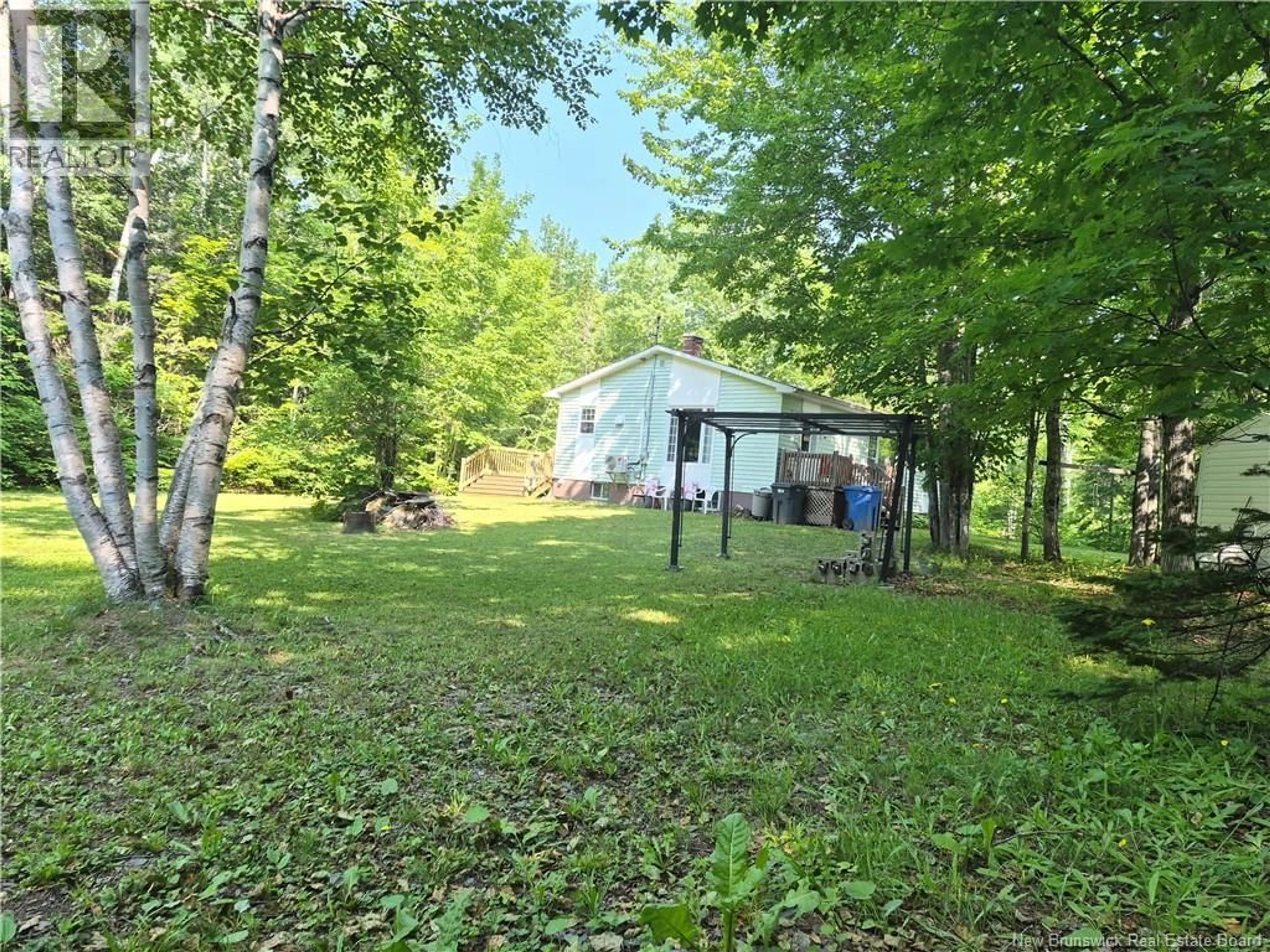 A pic from outside/outdoor area/front of a property/back of a property/a pic from drone, forest/trees view for 509 RUE FRANCOIS, Petit-Rocher New Brunswick E8J1X1