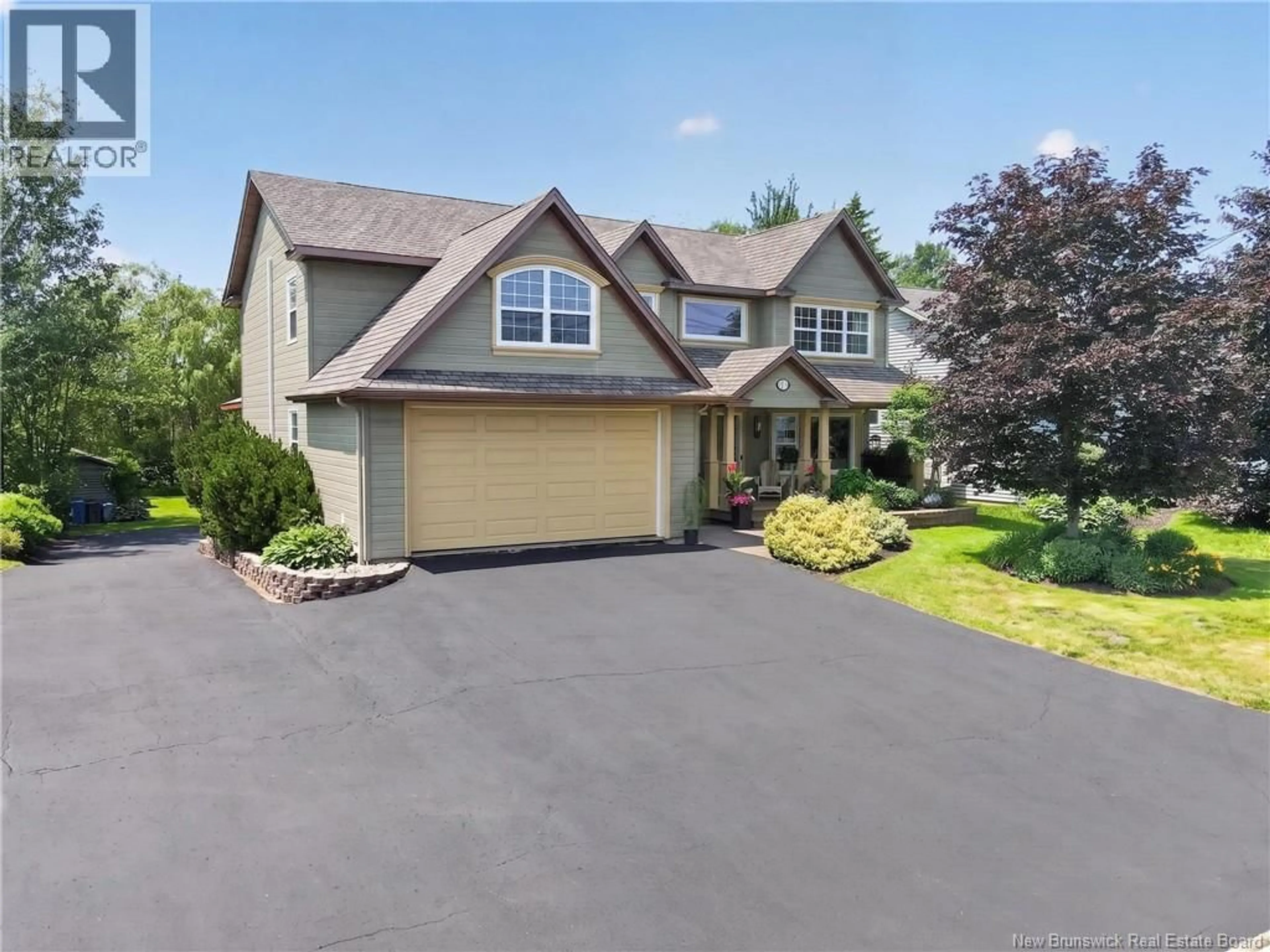 Home with vinyl exterior material, street for 50 MEUNIER STREET, Dieppe New Brunswick E1A7W9