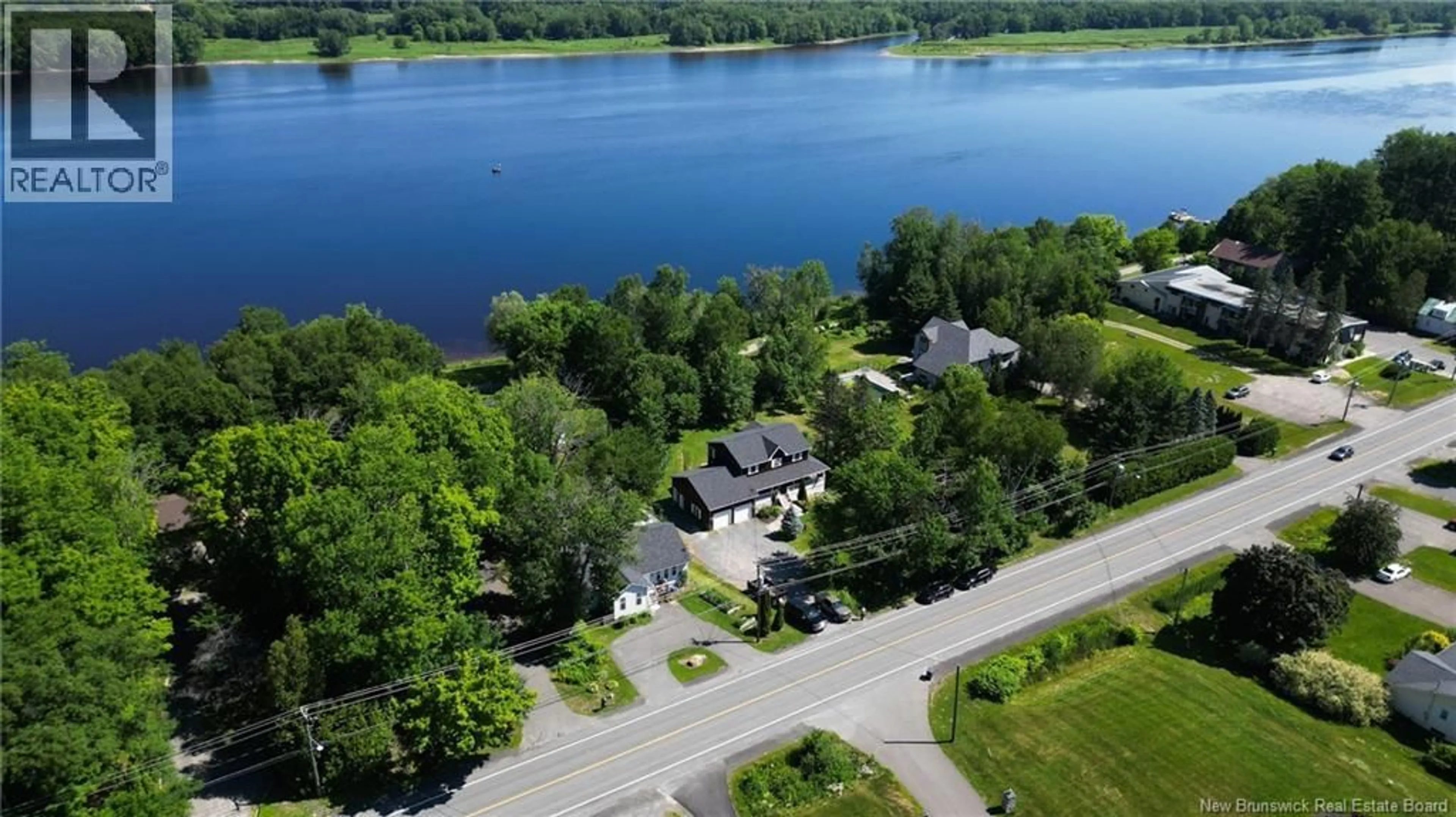 A pic from outside/outdoor area/front of a property/back of a property/a pic from drone, water/lake/river/ocean view for 1517 WOODSTOCK ROAD, Fredericton New Brunswick E3C1P2