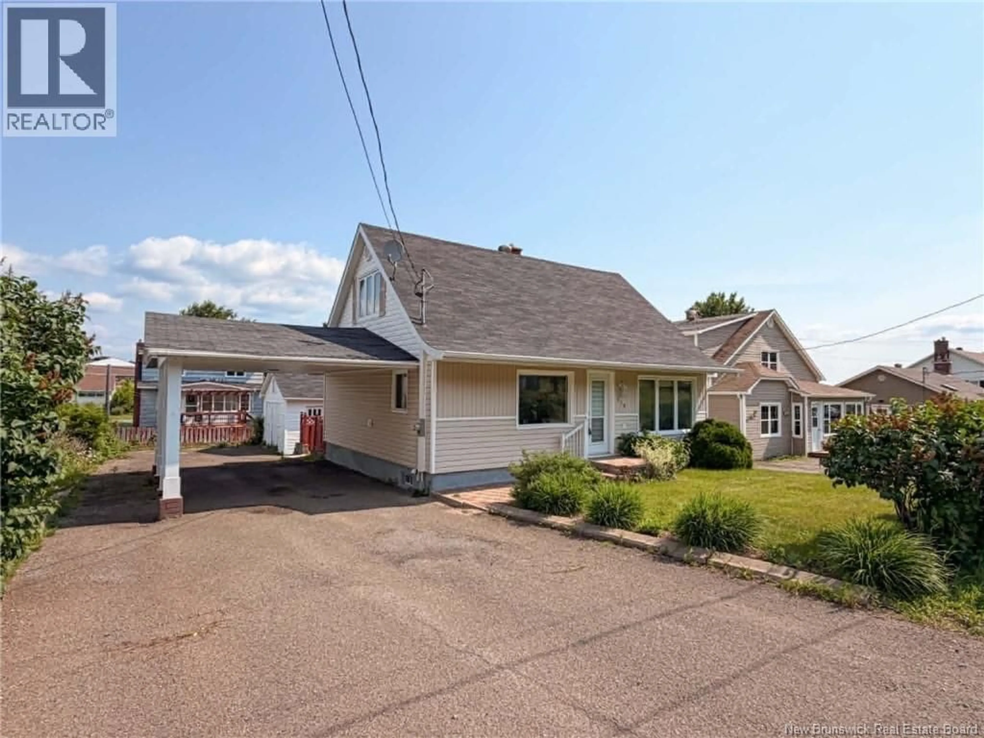 Home with vinyl exterior material, street for 319 GODERICH STREET, Dalhousie New Brunswick E8C1T8