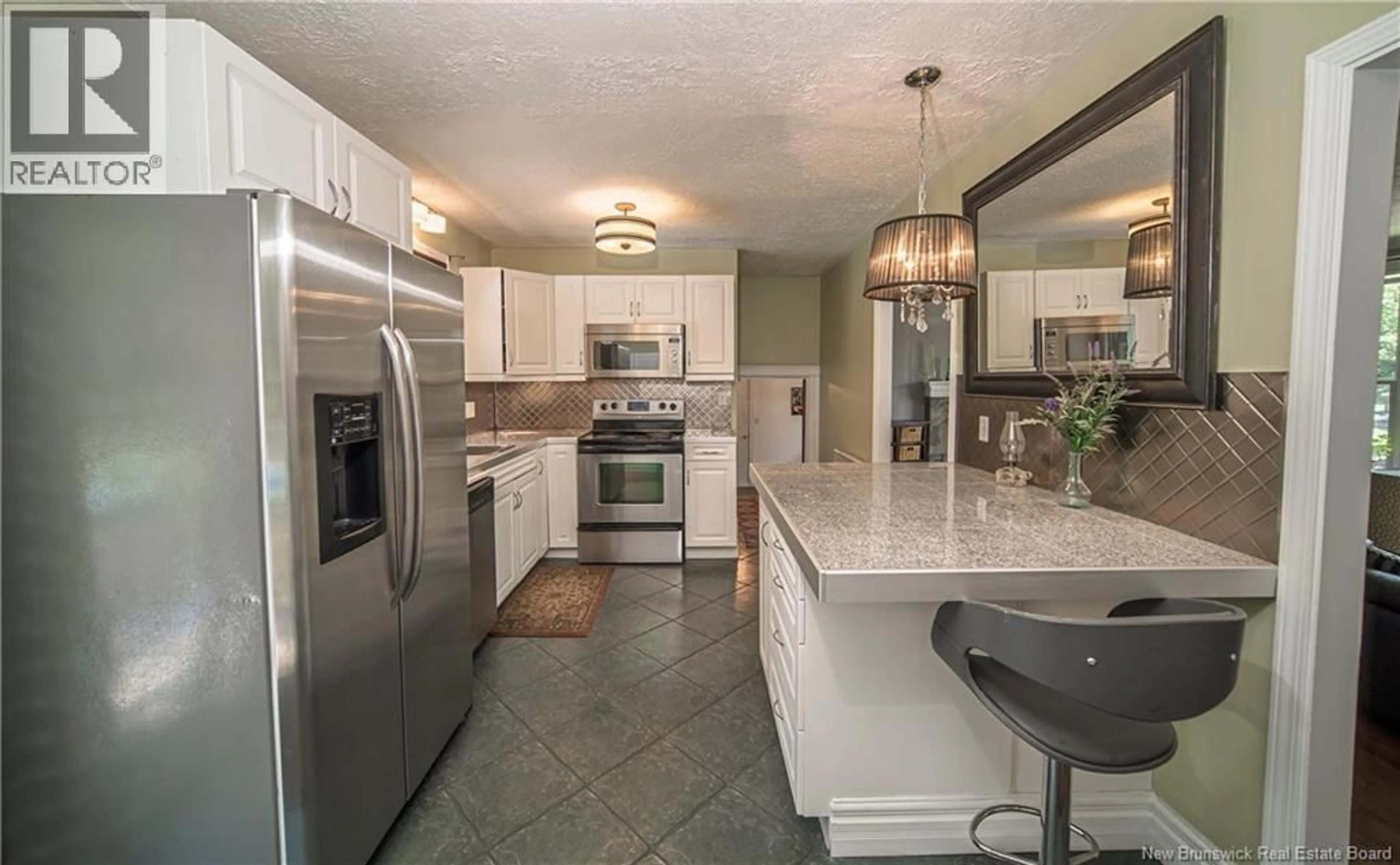 Open concept kitchen, ceramic/tile floor for 133 LEEDS DRIVE, Fredericton New Brunswick E3B4S7