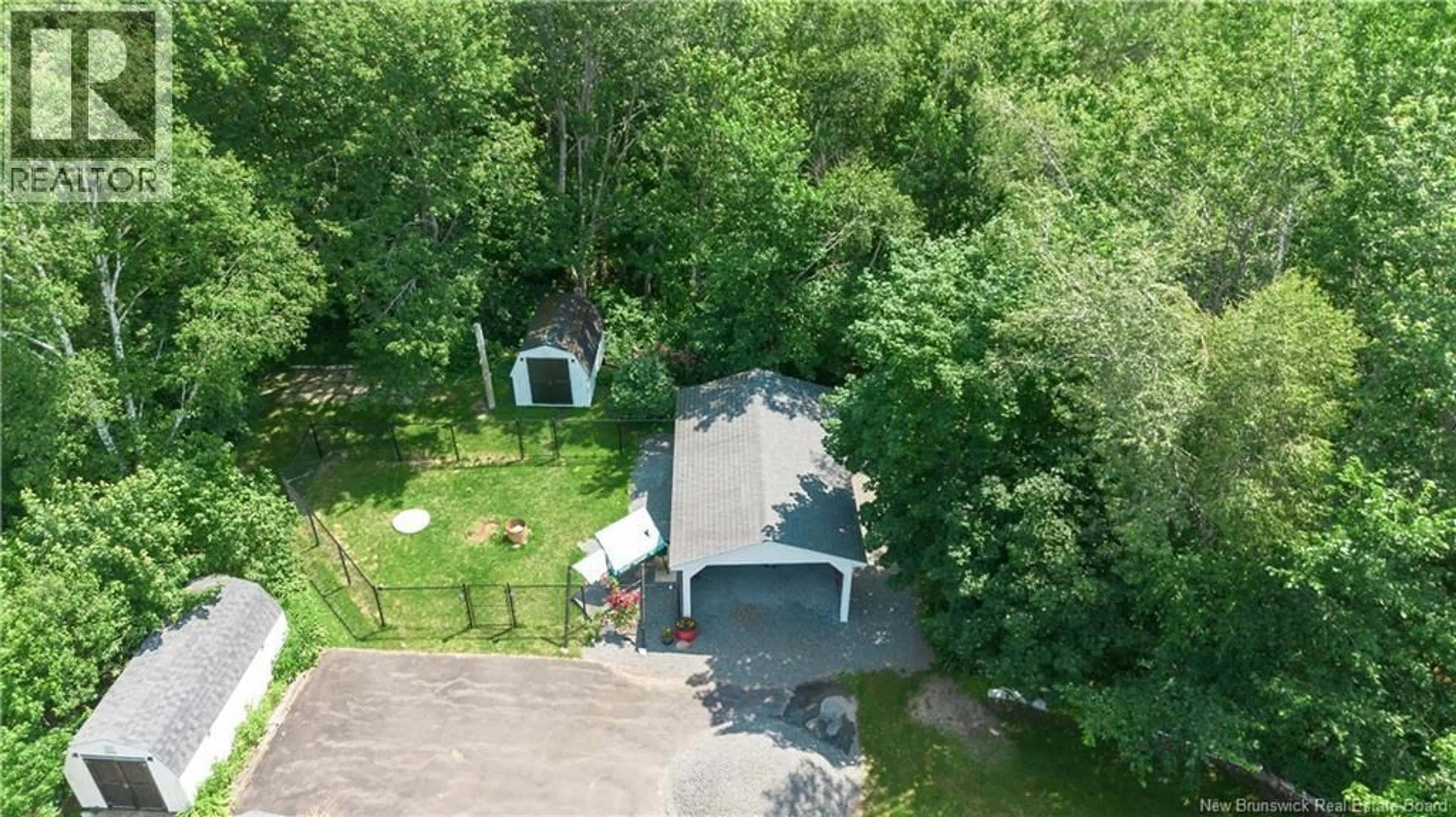 A pic from outside/outdoor area/front of a property/back of a property/a pic from drone, forest/trees view for 816 PLEASANT STREET, Minto New Brunswick E4B2V1