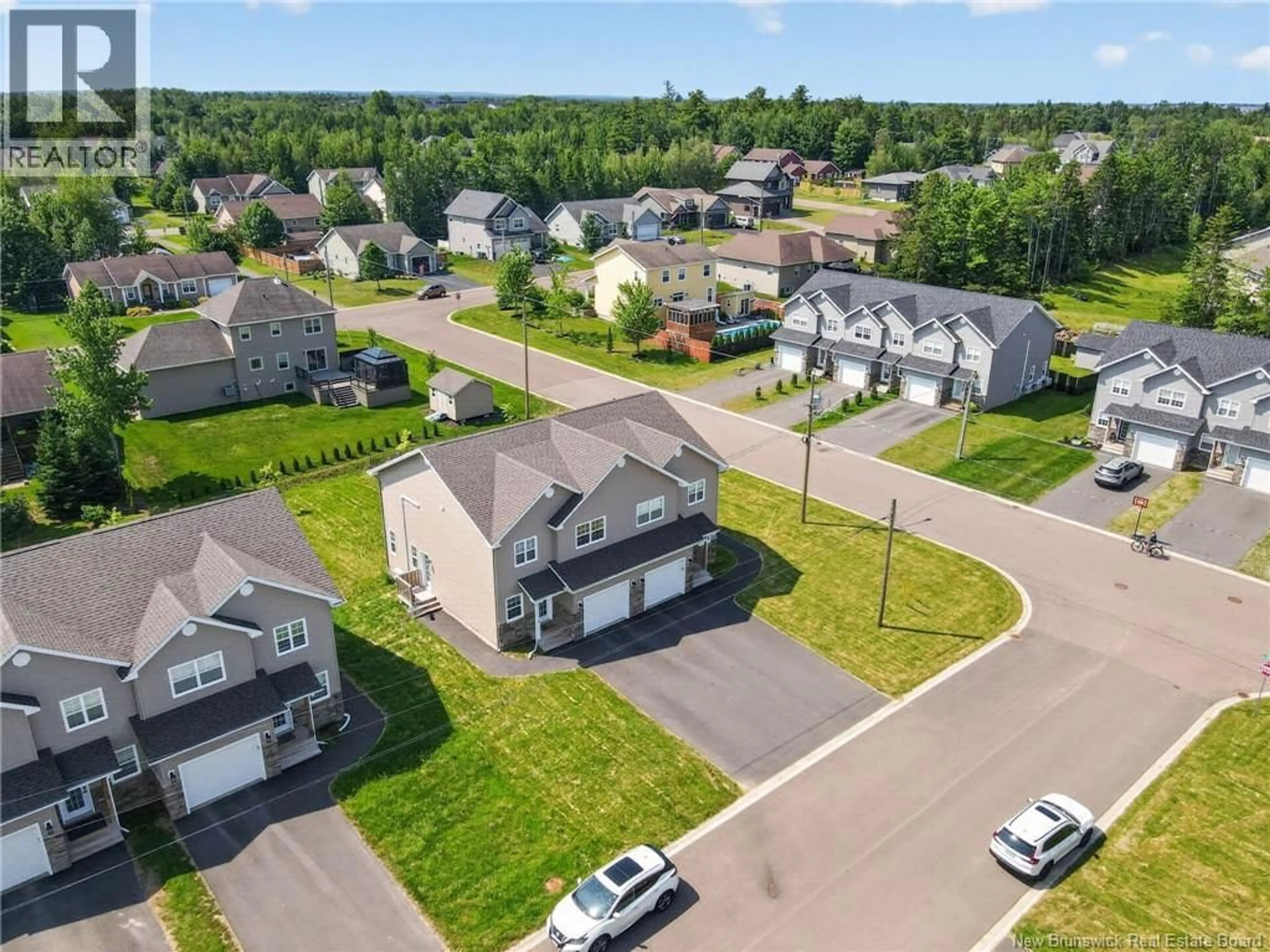 A pic from outside/outdoor area/front of a property/back of a property/a pic from drone, street for 8 ROCHEFORT STREET, Dieppe New Brunswick E1A6S4