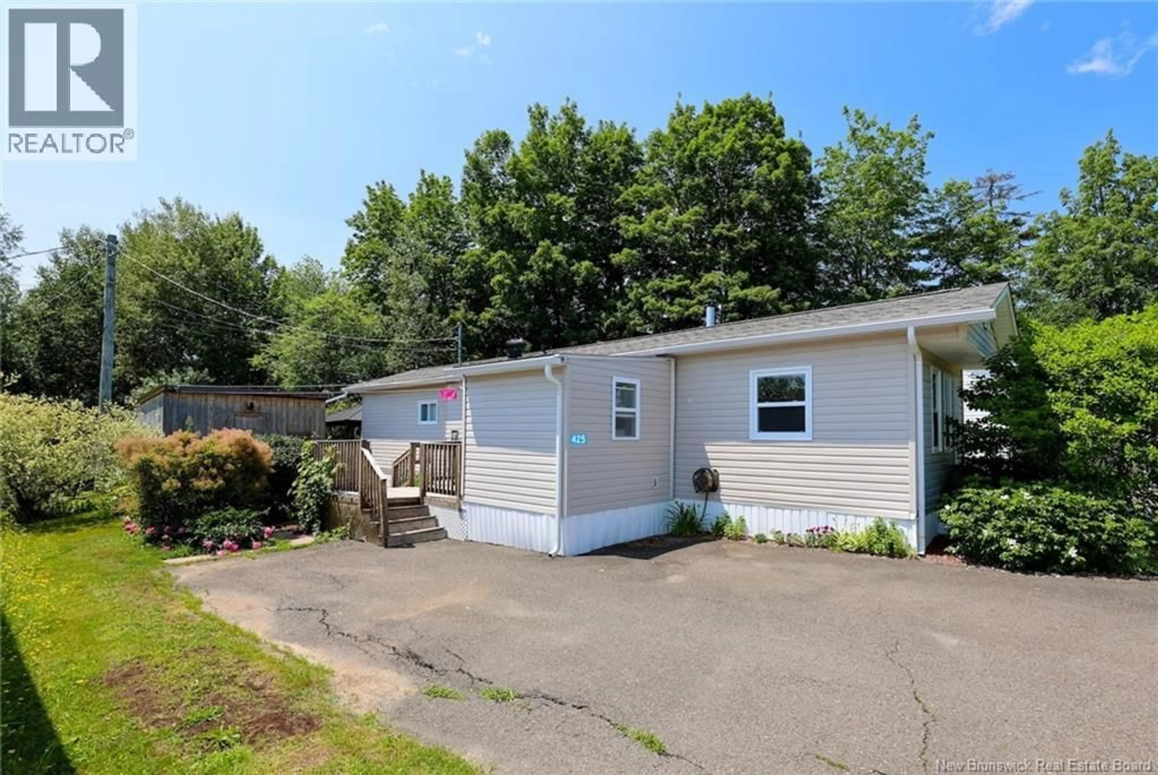 Home with vinyl exterior material, street for 425 KINGSLEY ROAD, Douglas New Brunswick E3G6C3