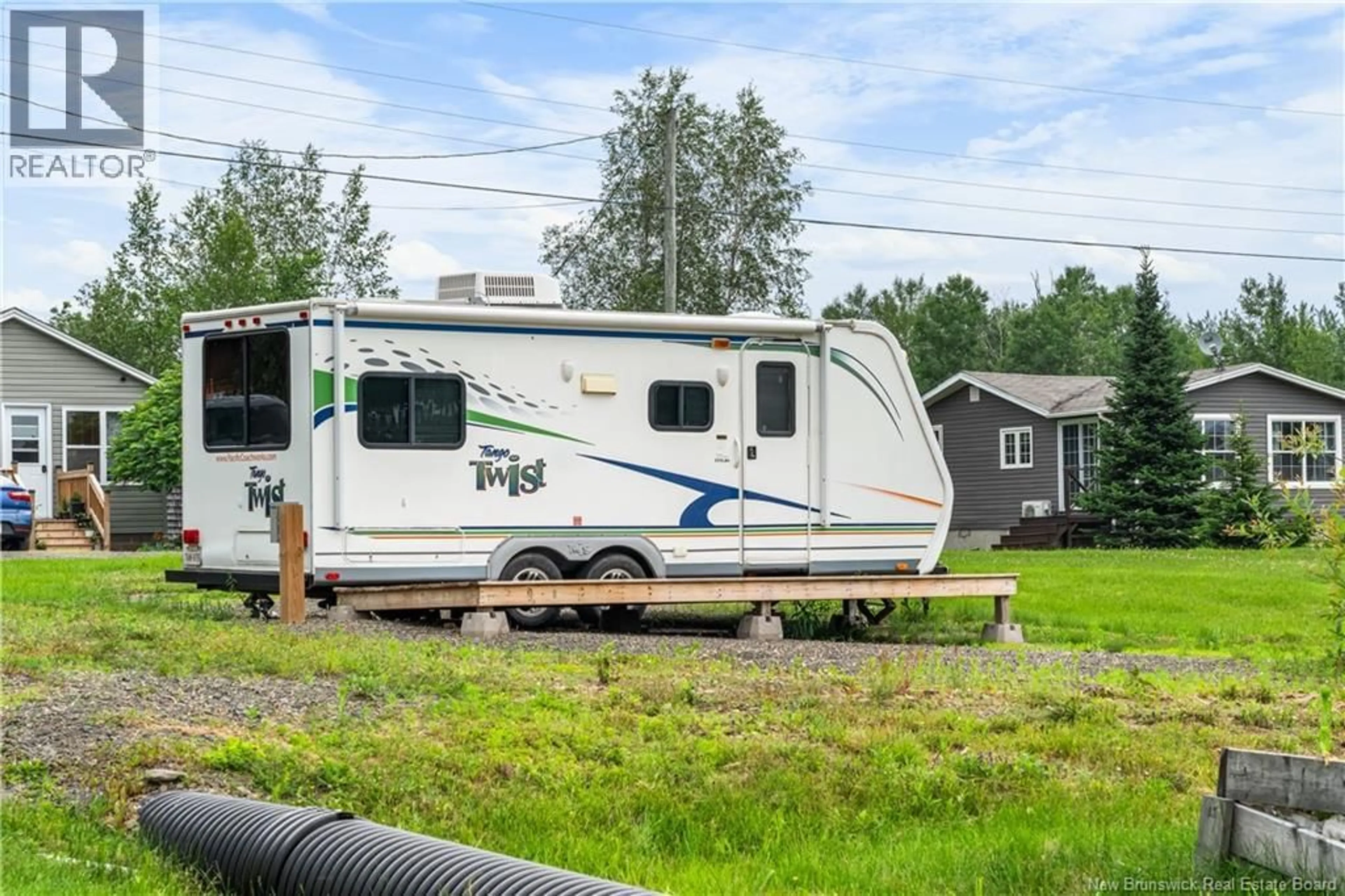 Home with vinyl exterior material, street for 123 ALBERT ROAD, Notre-Dame New Brunswick E4V1S3