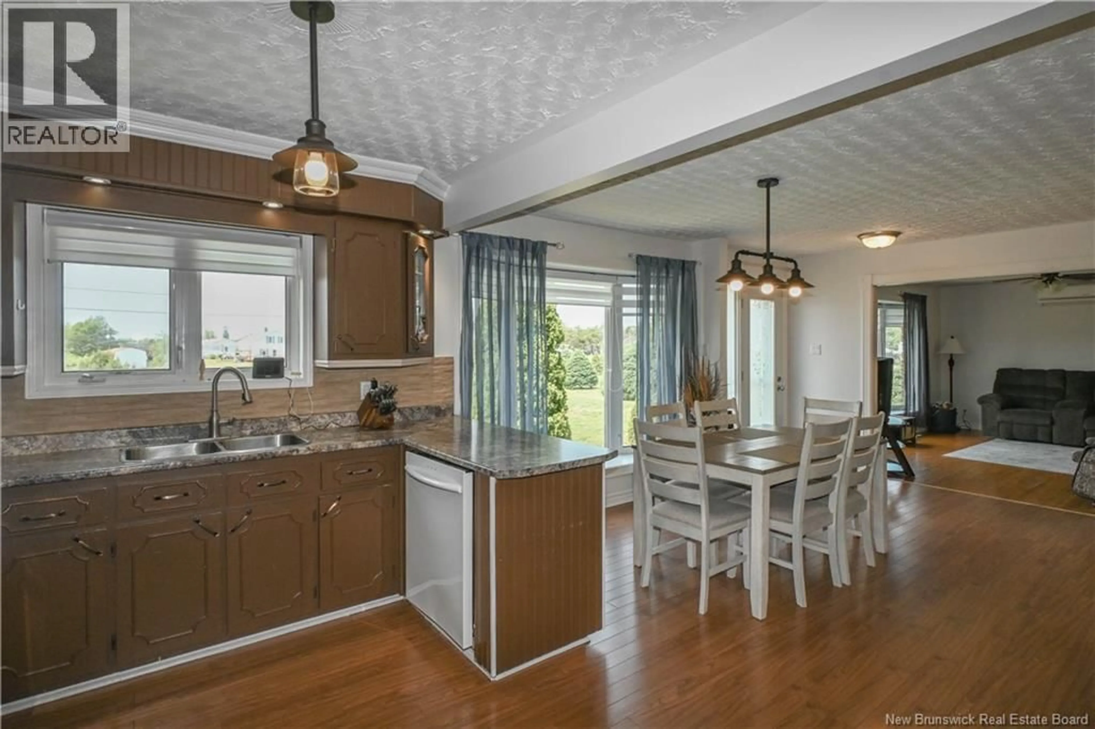 Open concept kitchen, unknown for 20 DU LAC ROAD, Val-Comeau New Brunswick E1X4A3