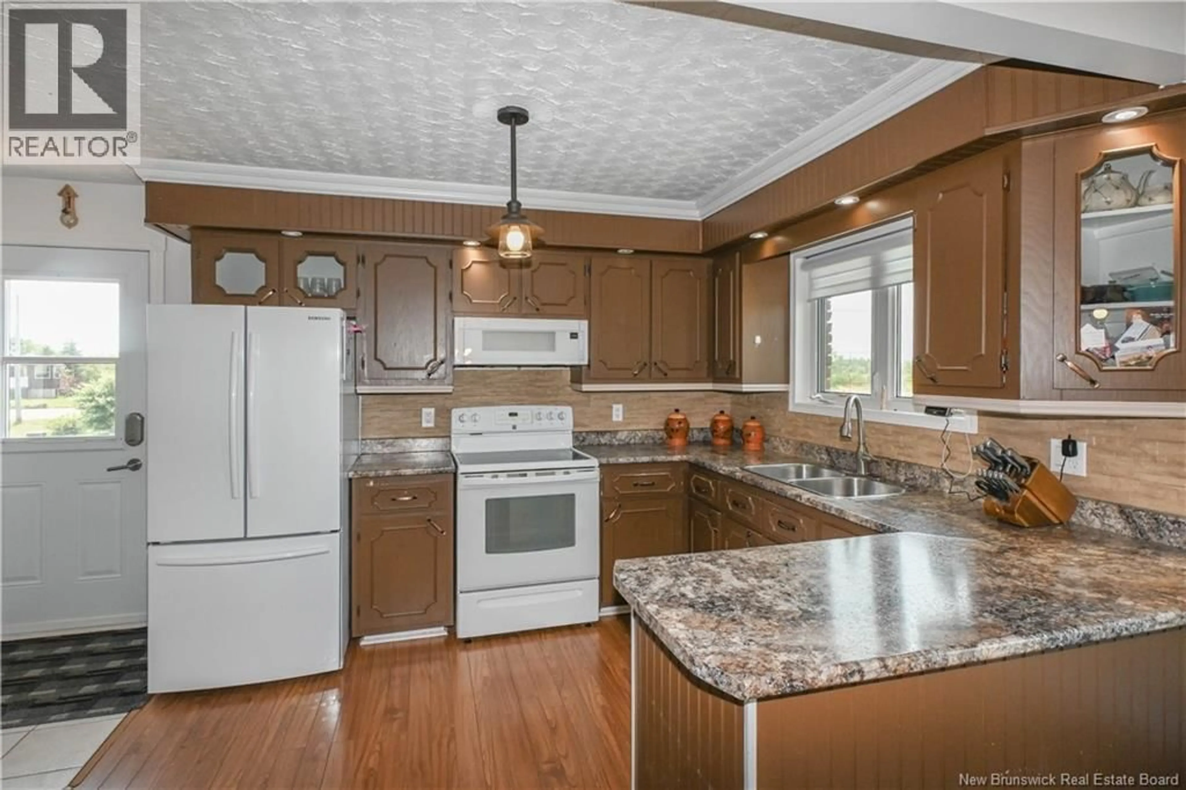 Open concept kitchen, unknown for 20 DU LAC ROAD, Val-Comeau New Brunswick E1X4A3