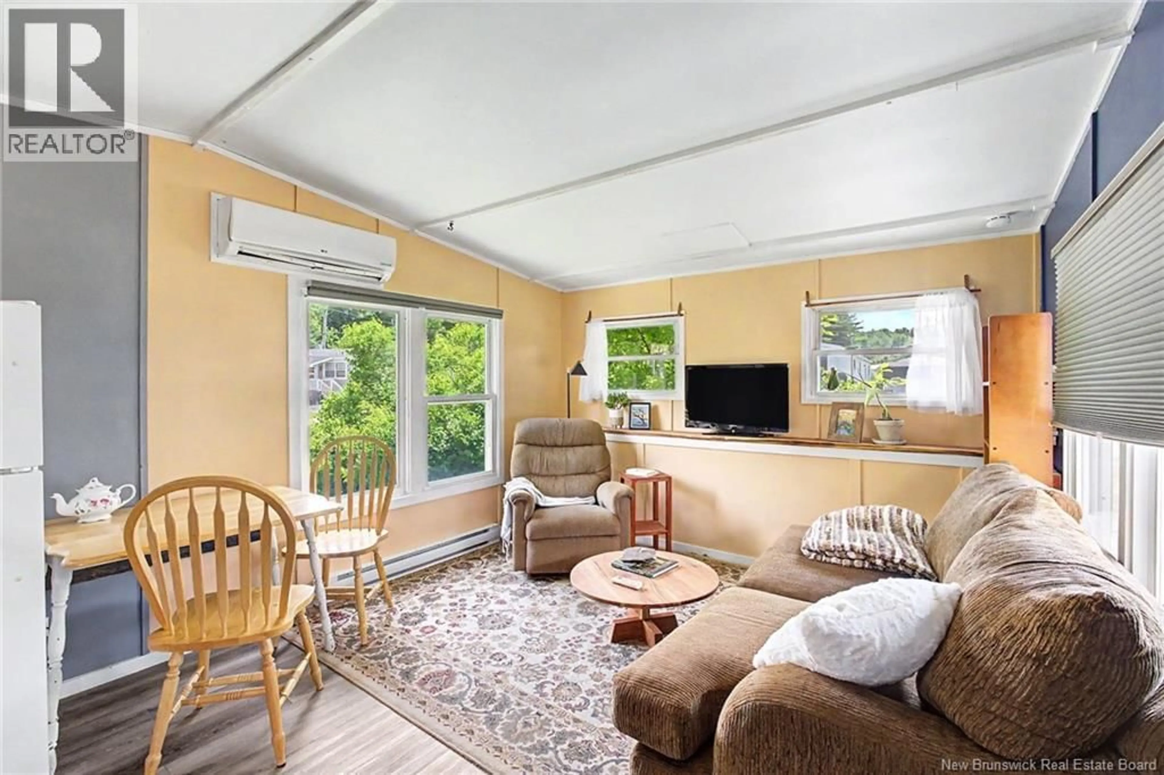 Living room with furniture, unknown for 225 DRIFTWOOD LOOP, Fredericton New Brunswick E3B7P1
