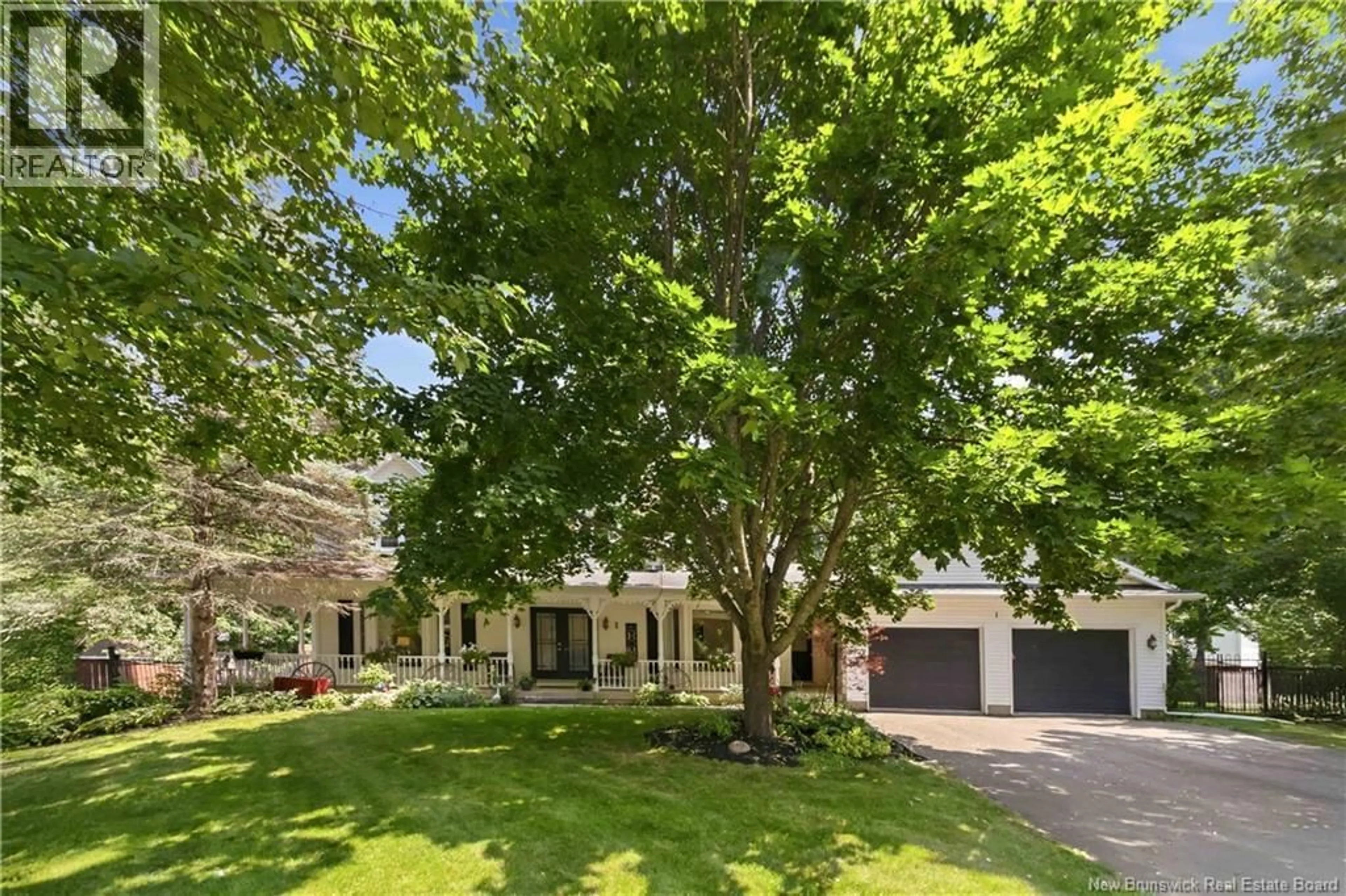 A pic from outside/outdoor area/front of a property/back of a property/a pic from drone, street for 1 BASSWOOD COURT, Moncton New Brunswick E1G2E5
