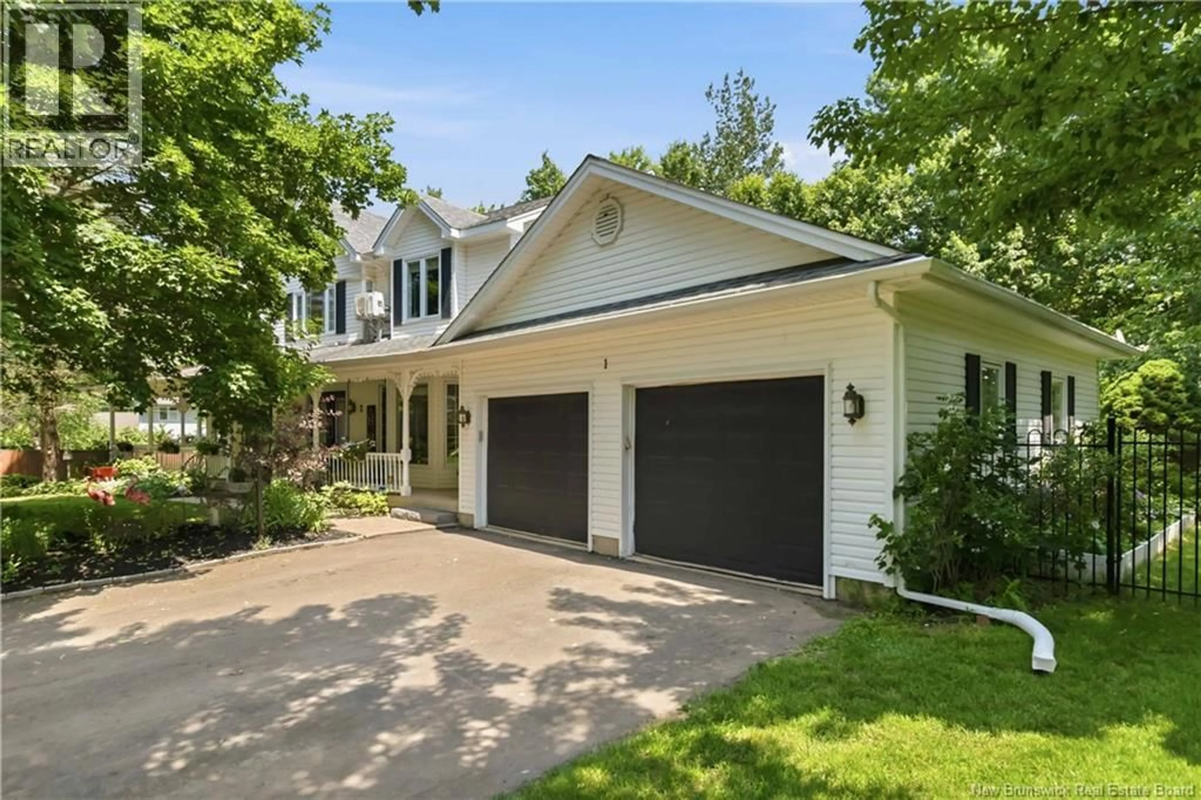 Home with vinyl exterior material, street for 1 BASSWOOD COURT, Moncton New Brunswick E1G2E5