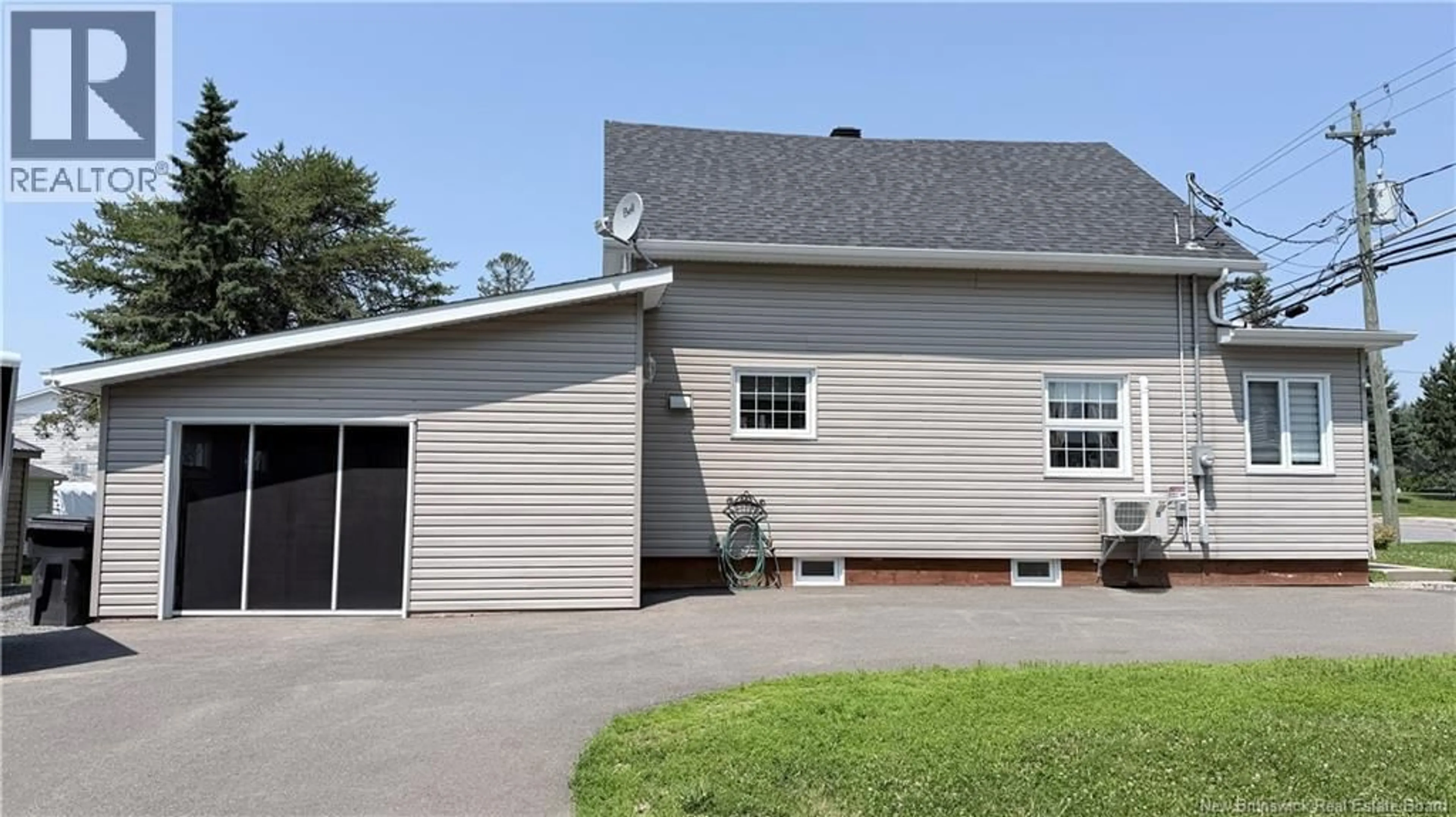 Home with vinyl exterior material, street for 784 PRINCIPAL STREET, Saint-Léonard New Brunswick E7E2H8