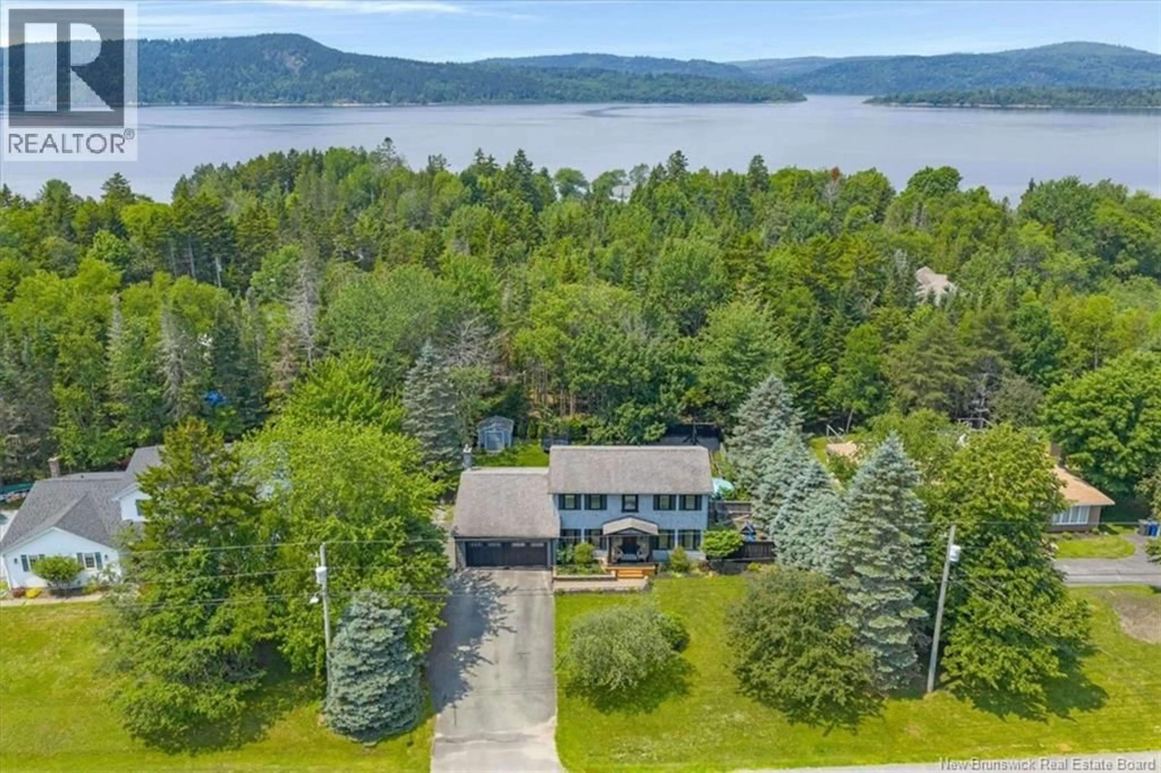 A pic from outside/outdoor area/front of a property/back of a property/a pic from drone, water/lake/river/ocean view for 24 BEACH DRIVE, Rothesay New Brunswick E2E4X3