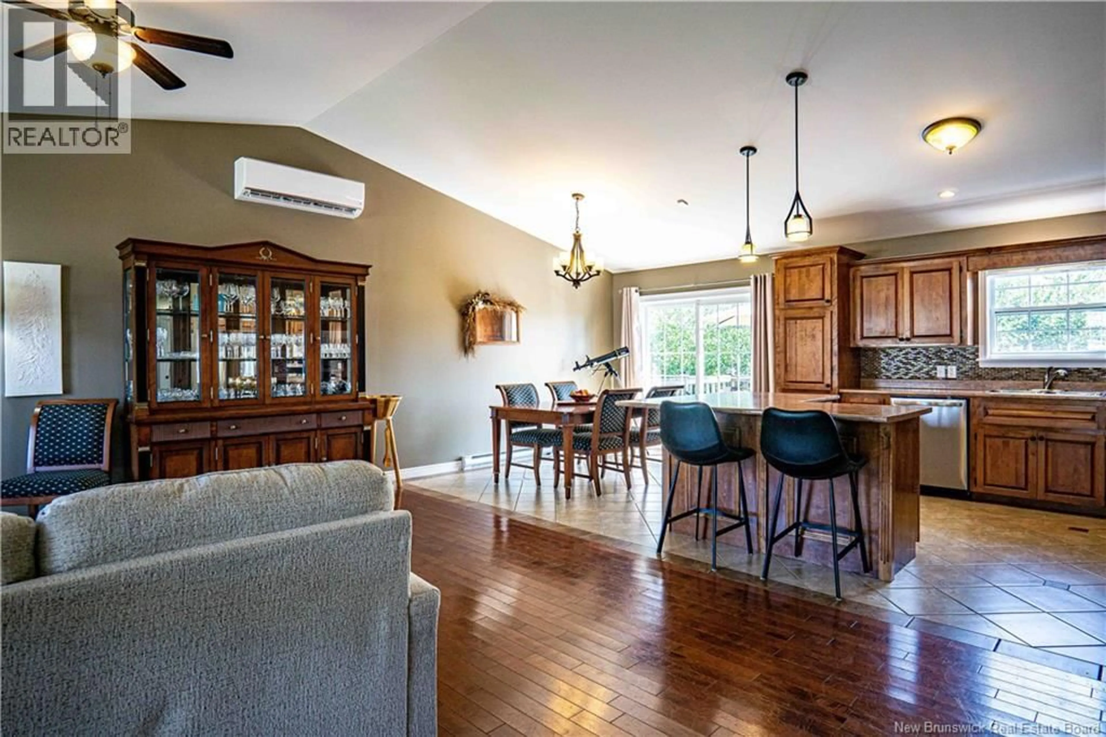 Open concept kitchen, wood/laminate floor for 12 BURNETT, Oromocto New Brunswick E2V0J4