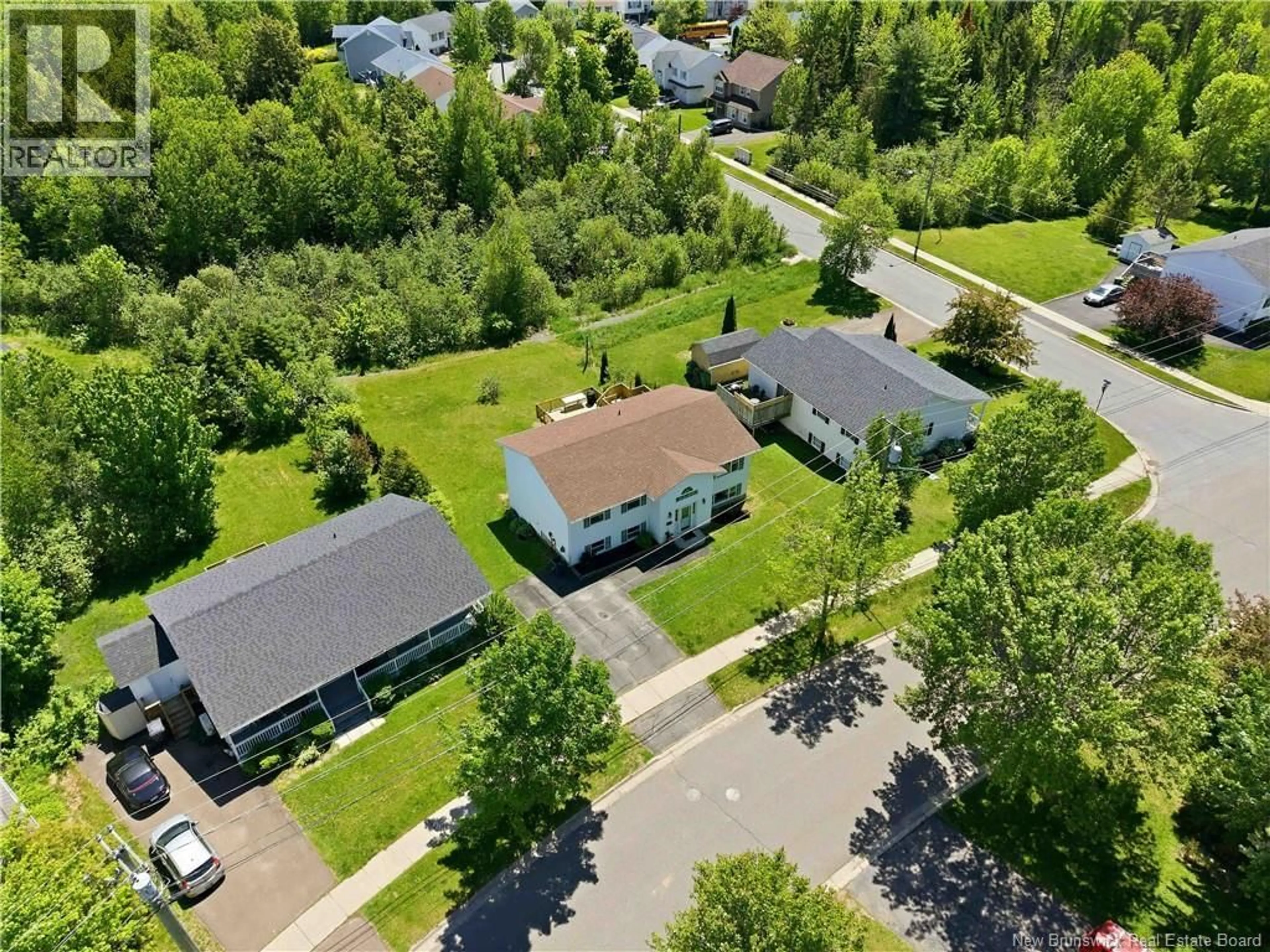 A pic from outside/outdoor area/front of a property/back of a property/a pic from drone, street for 30 LEISURE AVENUE, Fredericton New Brunswick E3B9K8