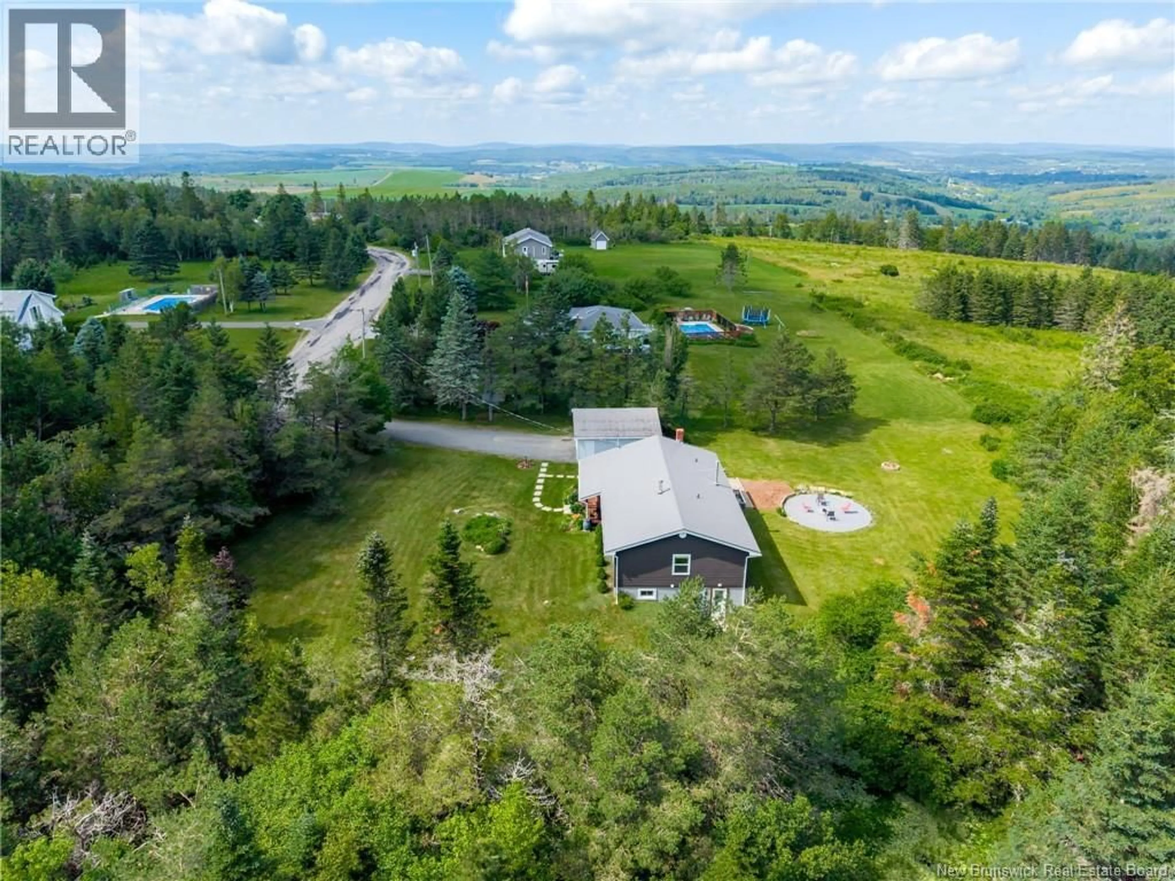 A pic from outside/outdoor area/front of a property/back of a property/a pic from drone, unknown for 55 VALLEYVIEW DRIVE, Wards Creek New Brunswick E4E4P5
