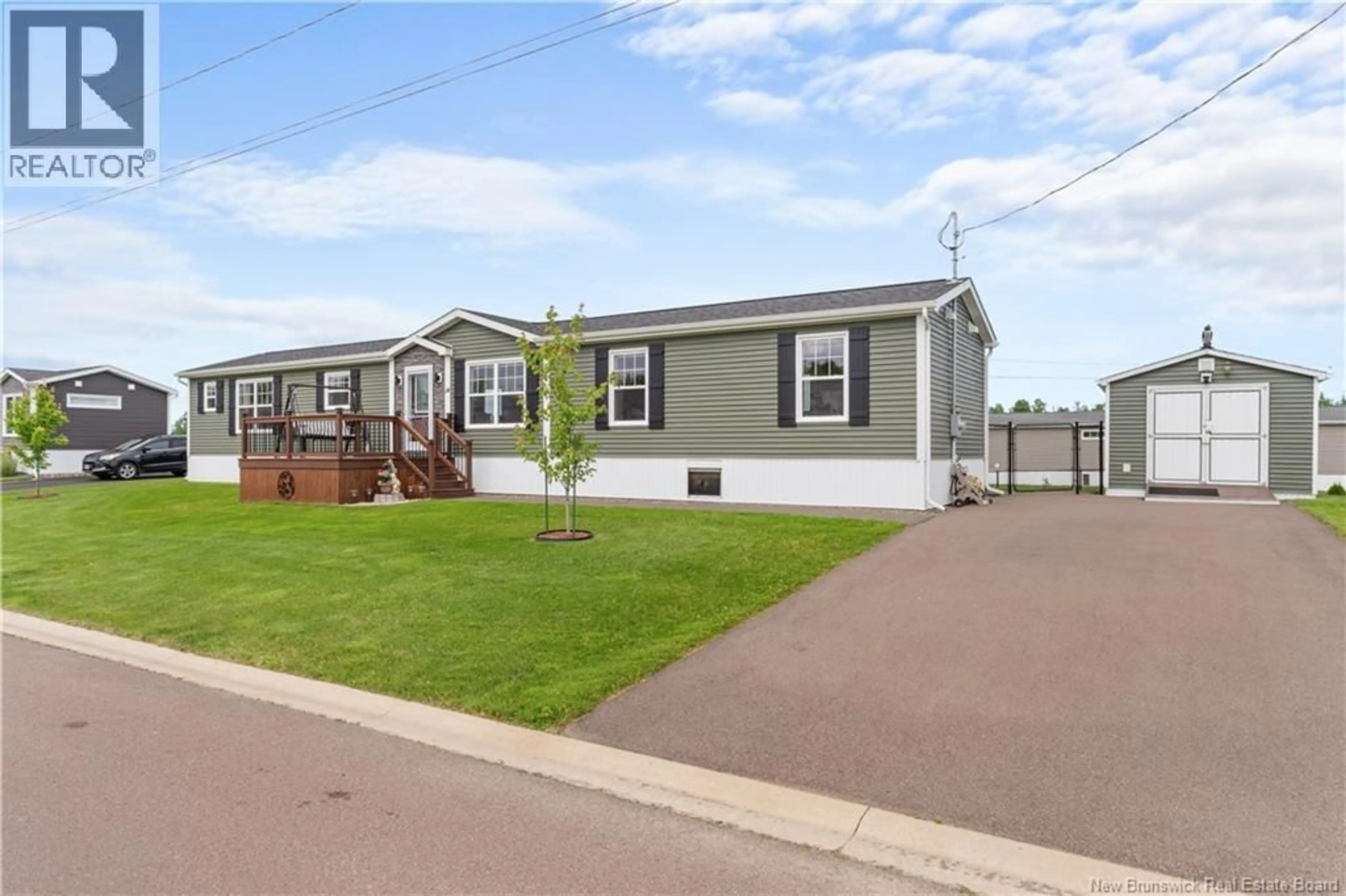 Home with vinyl exterior material, street for 14 RUE DE MONTS, Shediac New Brunswick E4P0V5
