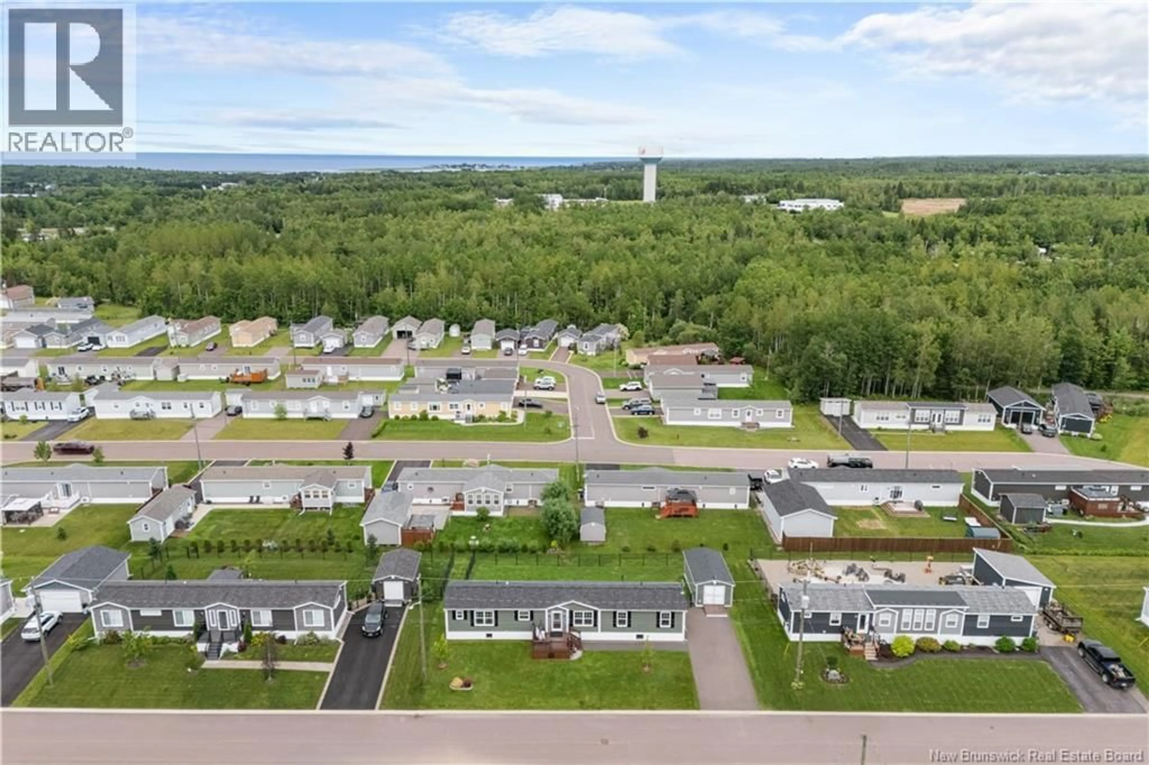 A pic from outside/outdoor area/front of a property/back of a property/a pic from drone, mountain view for 14 RUE DE MONTS, Shediac New Brunswick E4P0V5