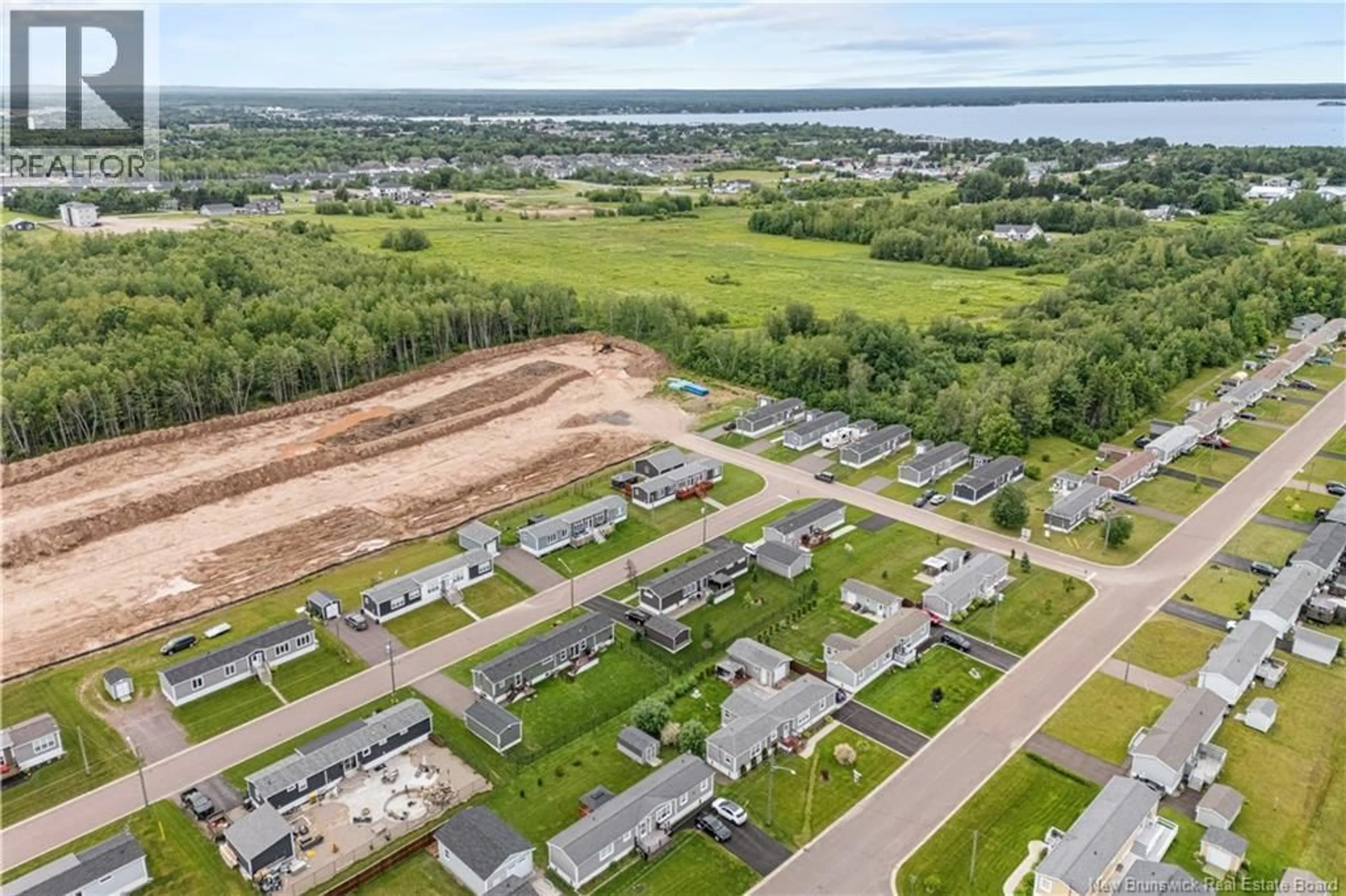A pic from outside/outdoor area/front of a property/back of a property/a pic from drone, water/lake/river/ocean view for 14 RUE DE MONTS, Shediac New Brunswick E4P0V5