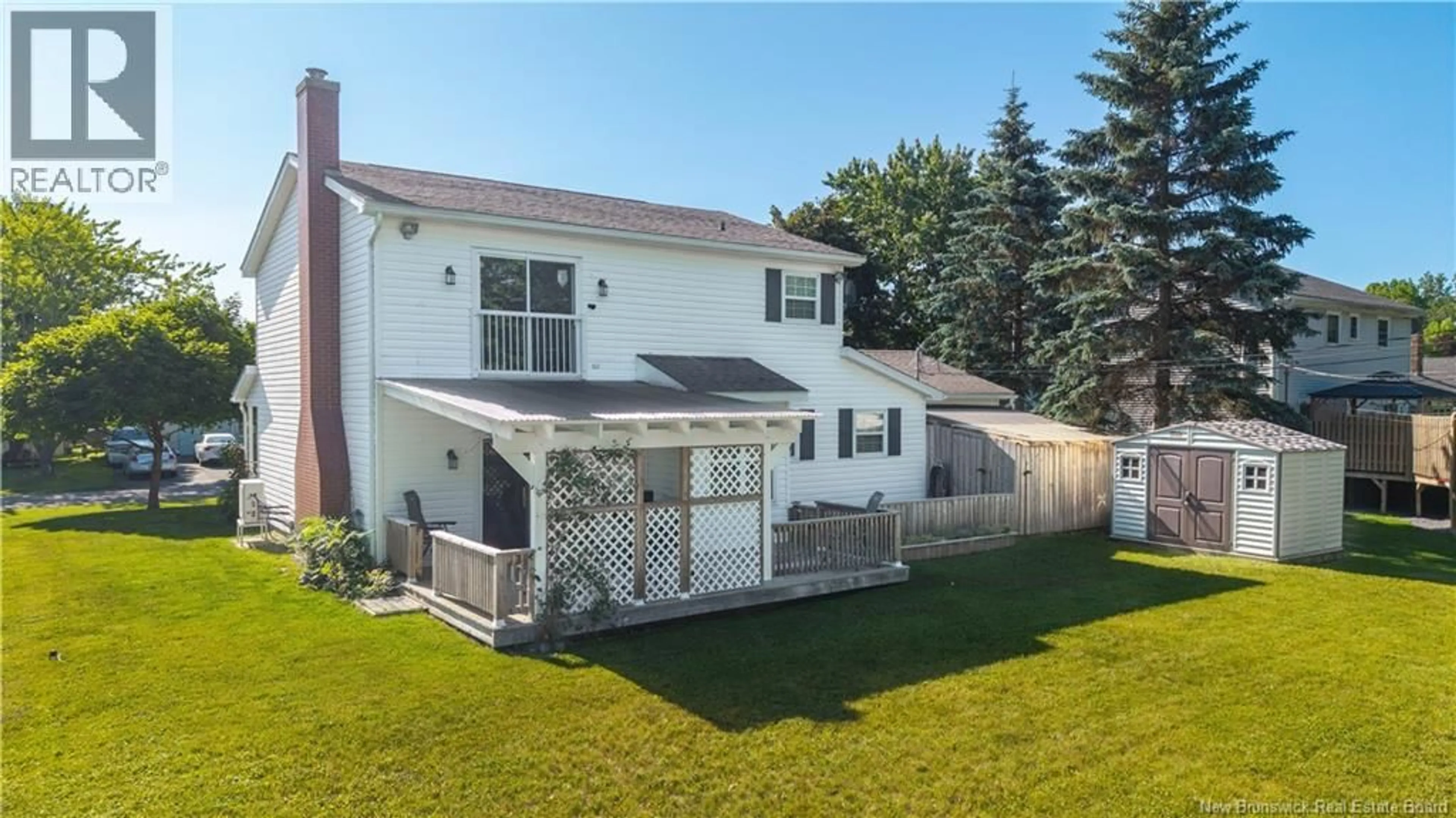 Home with vinyl exterior material, street for 24 ABBOTT STREET, St. Stephen New Brunswick E3L3C4