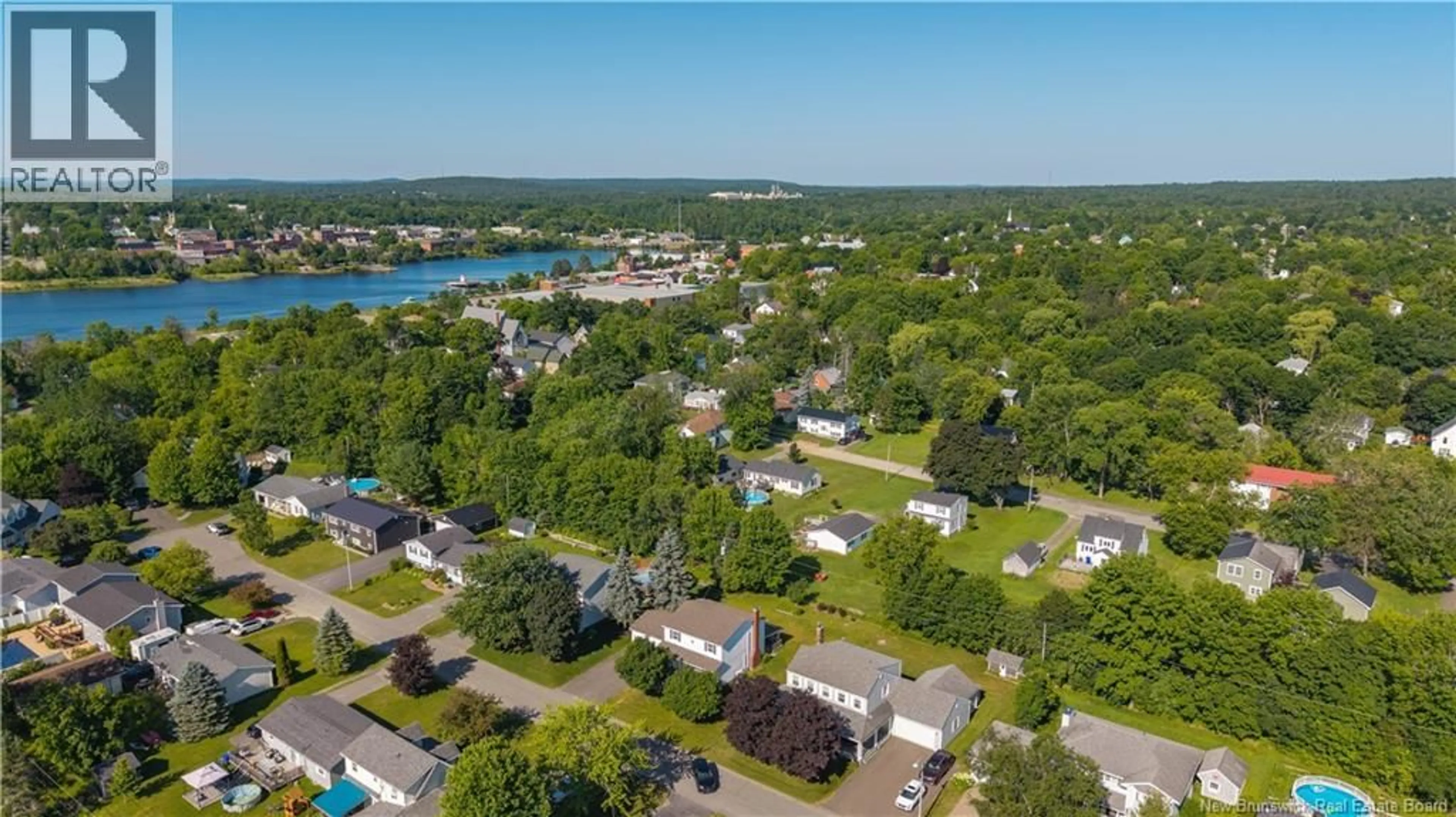 A pic from outside/outdoor area/front of a property/back of a property/a pic from drone, water/lake/river/ocean view for 24 ABBOTT STREET, St. Stephen New Brunswick E3L3C4