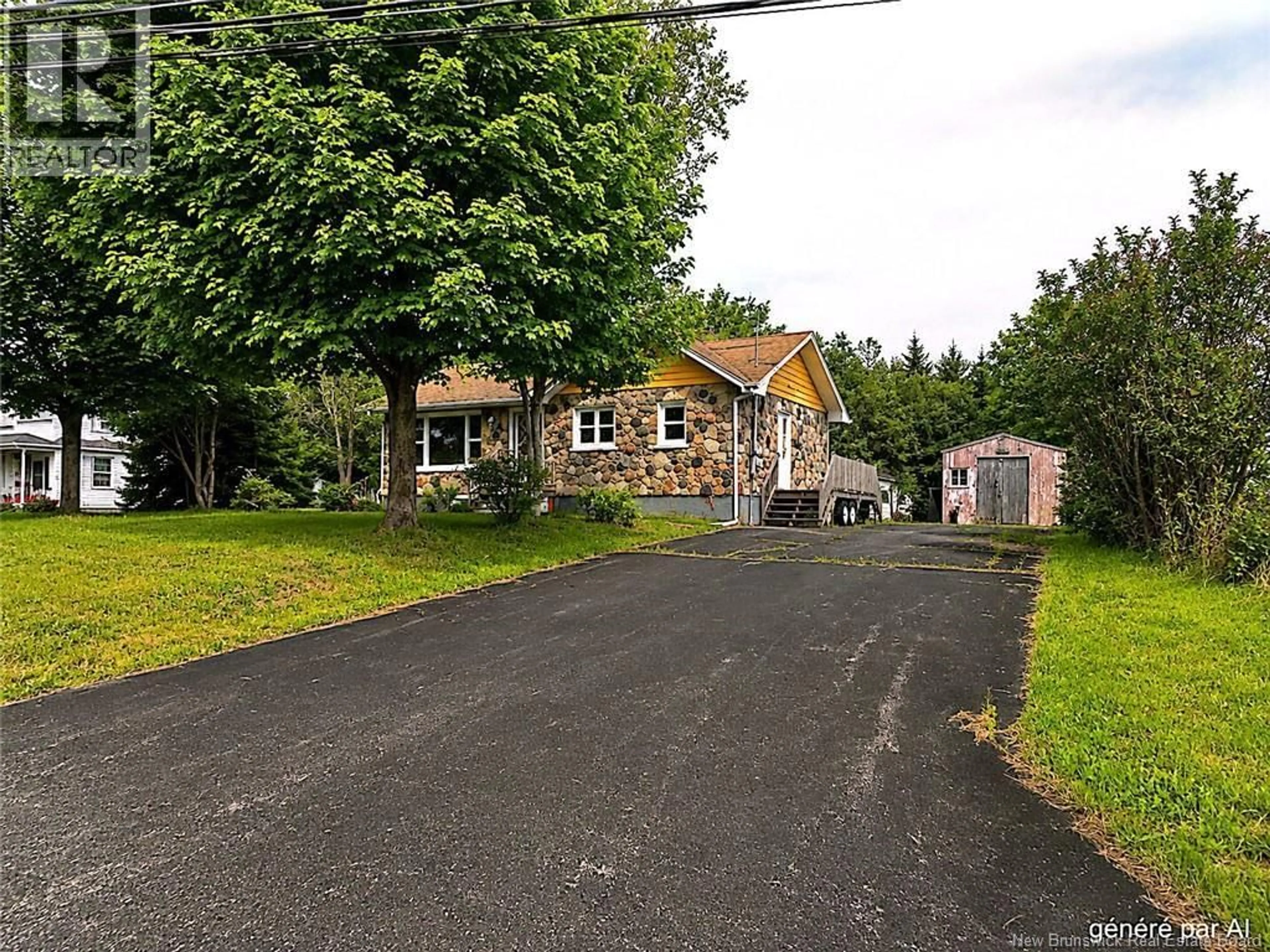 A pic from outside/outdoor area/front of a property/back of a property/a pic from drone, street for 3865 BLVD DES FONDATEURS BLVD, Saint-Isidore New Brunswick E8M1B7