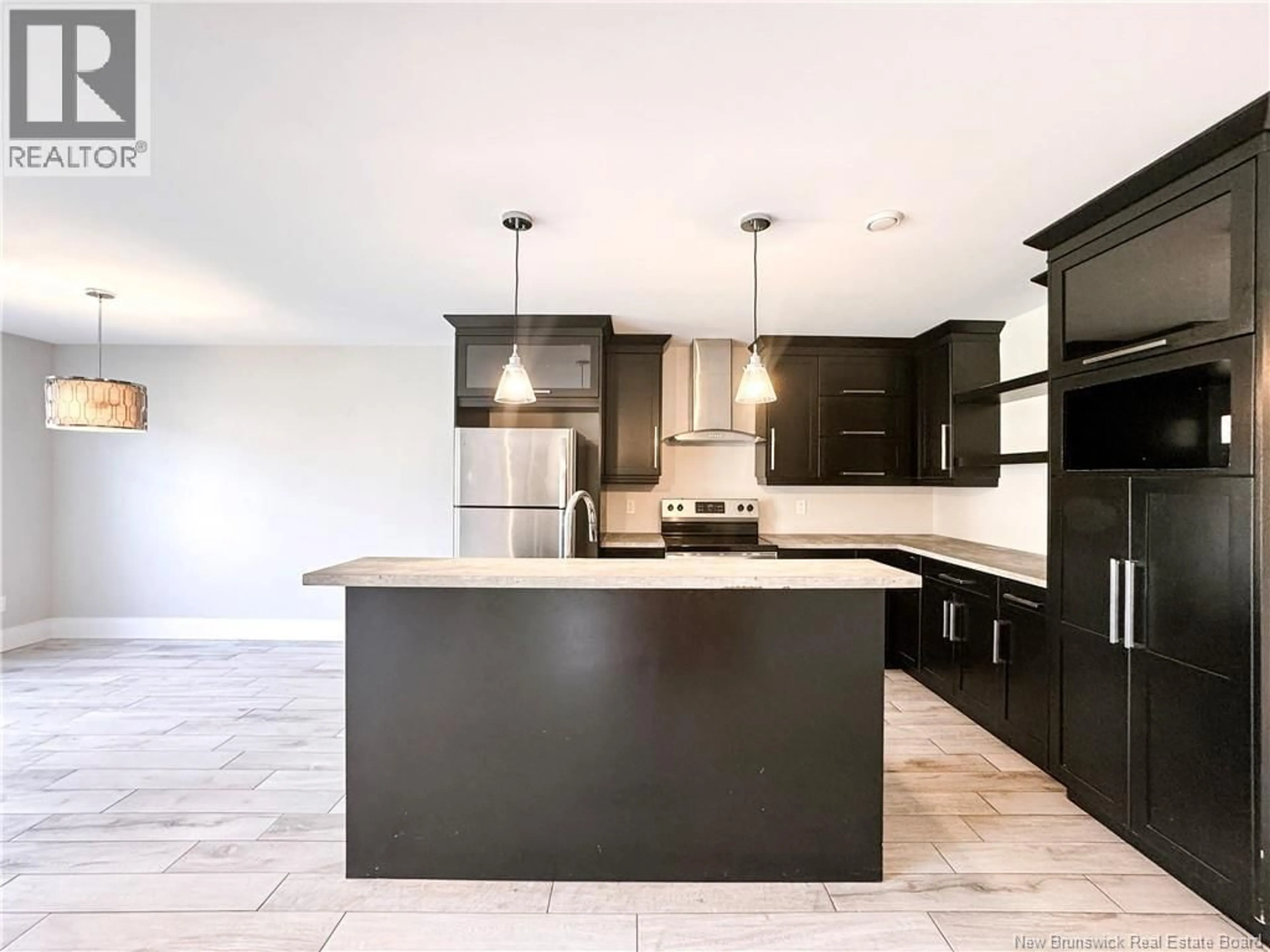 Open concept kitchen, ceramic/tile floor for 41 TIMANDRA CRESCENT, Moncton New Brunswick E1G5Y3
