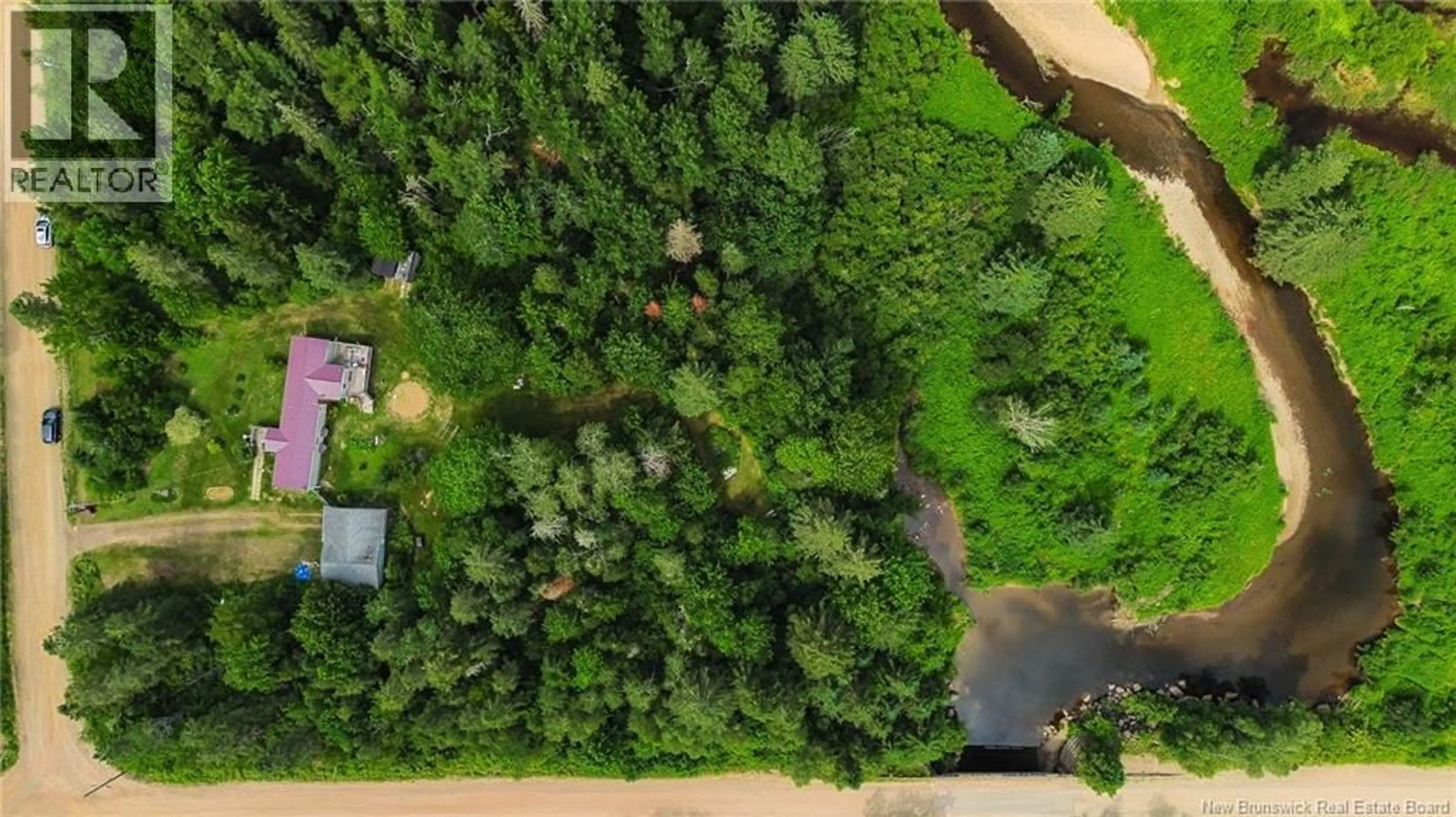A pic from outside/outdoor area/front of a property/back of a property/a pic from drone, forest/trees view for 4 BACK ROAD, Summerfield New Brunswick E4G2L2