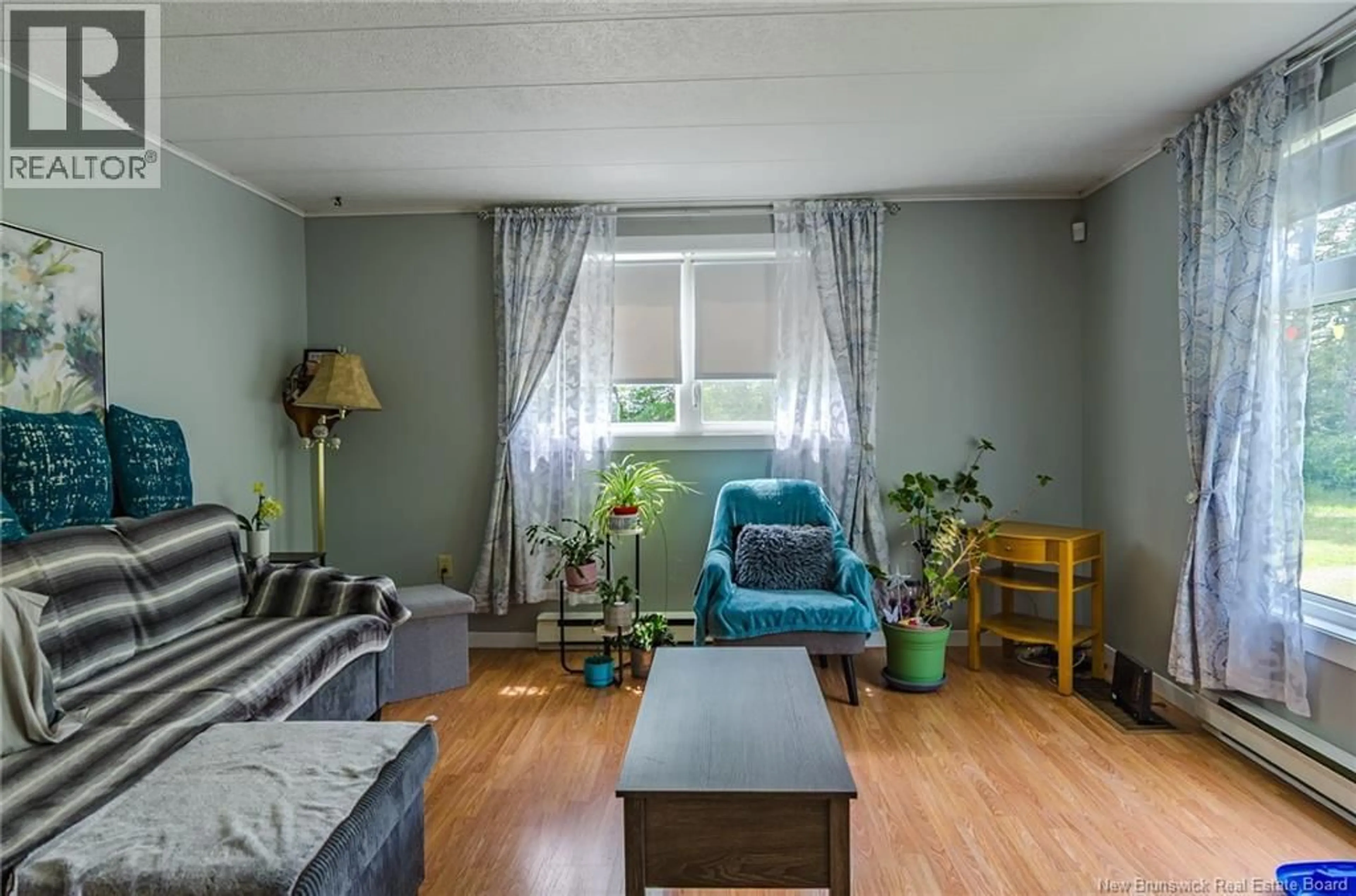 Living room with furniture, unknown for 4 BACK ROAD, Summerfield New Brunswick E4G2L2