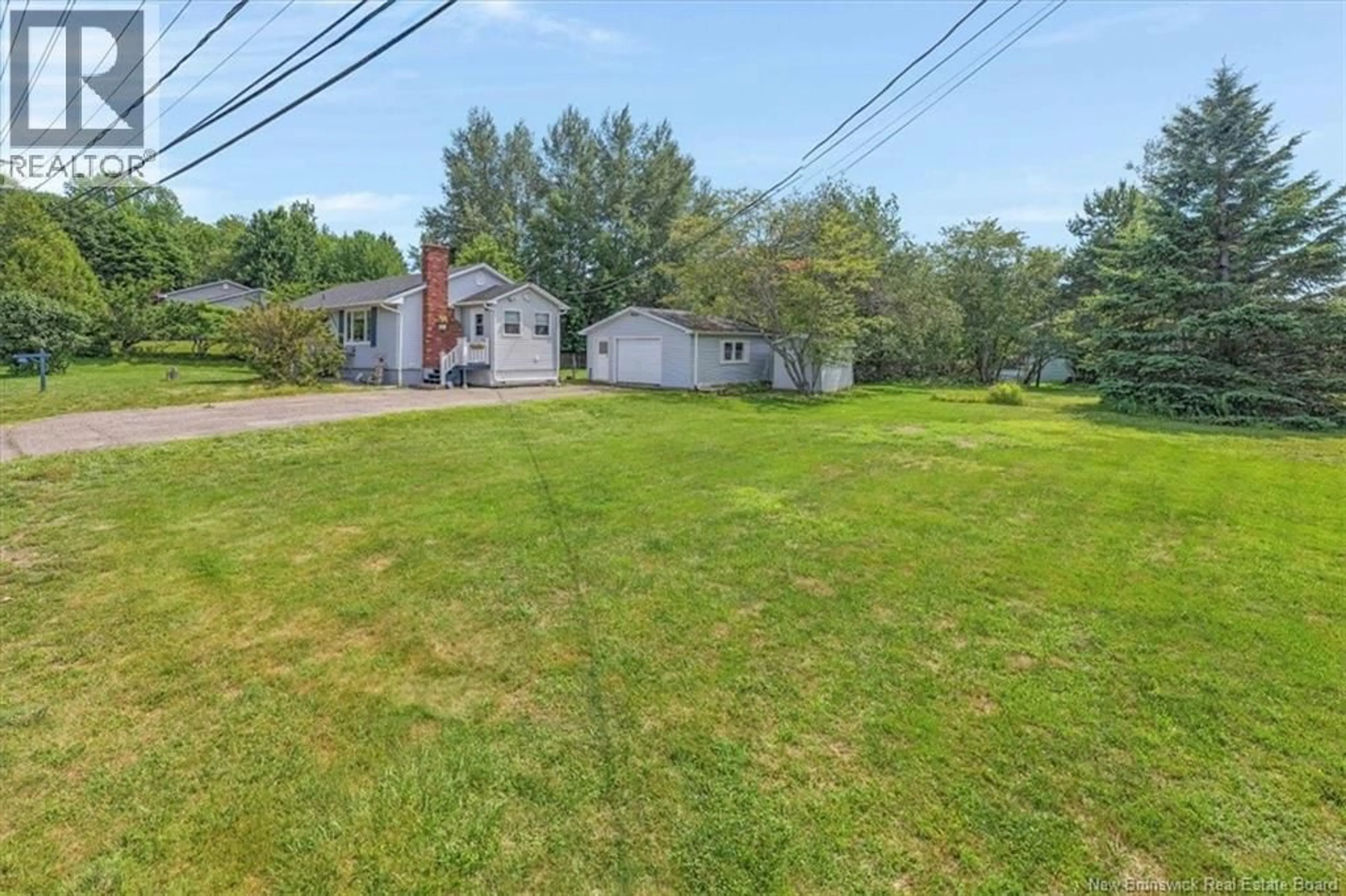 A pic from outside/outdoor area/front of a property/back of a property/a pic from drone, street for 10 DONLYN DRIVE, Quispamsis New Brunswick E2E4J7