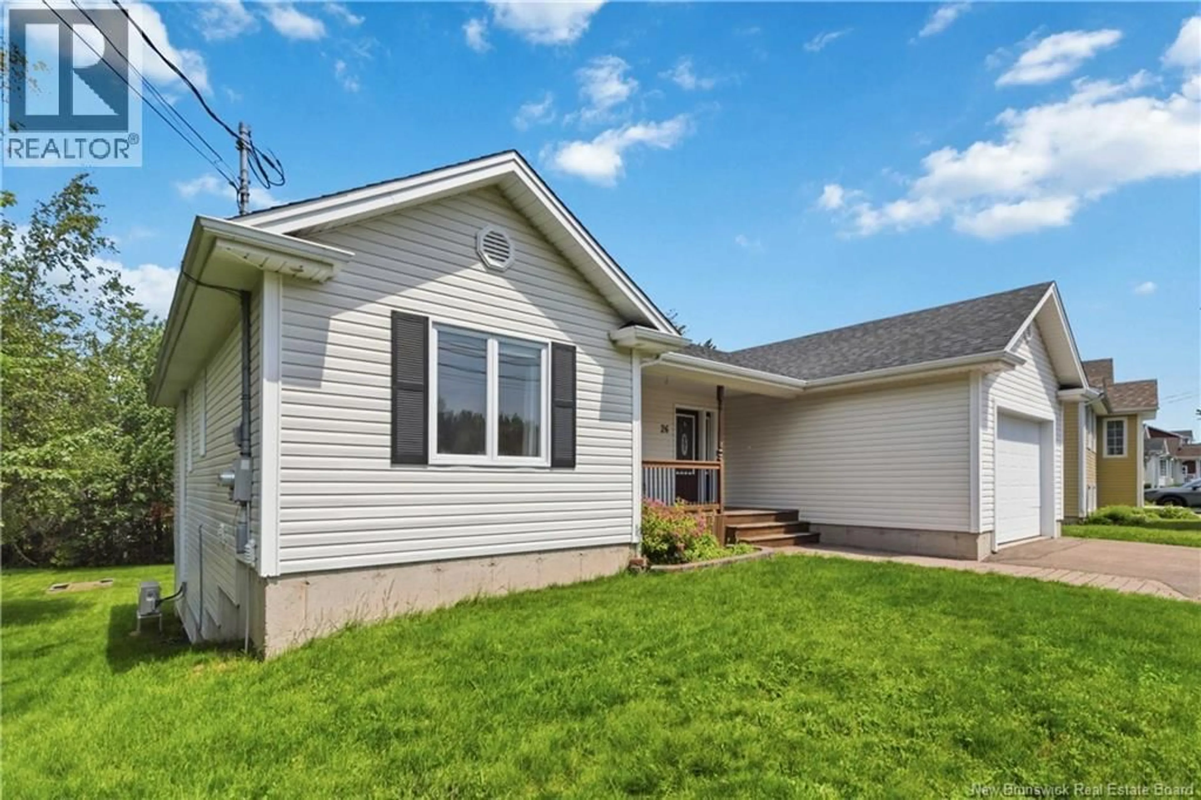 Home with vinyl exterior material, street for 26 RUE CHARDONNAY, Dieppe New Brunswick E1A8V8