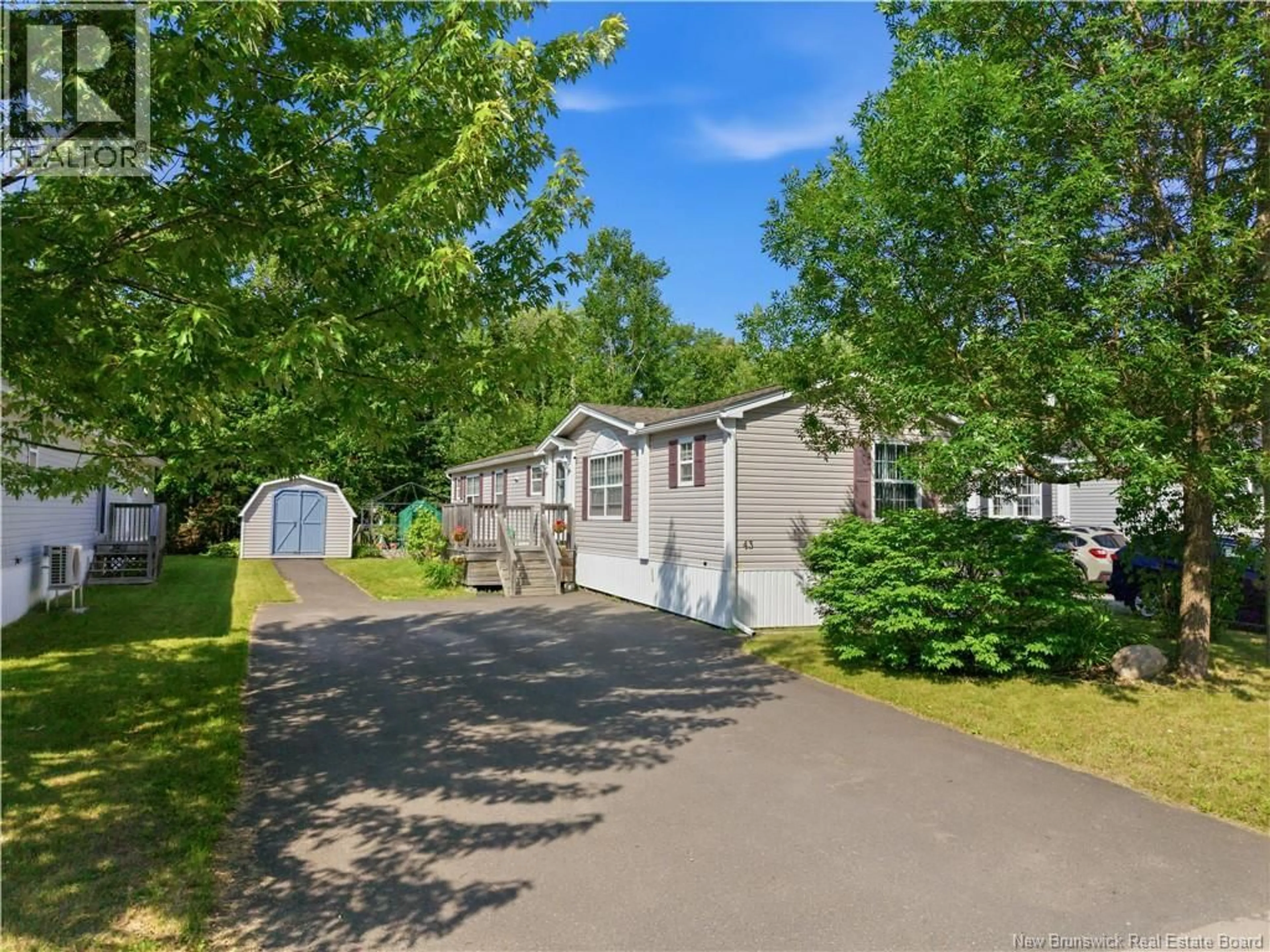 A pic from outside/outdoor area/front of a property/back of a property/a pic from drone, street for 43 GLENMAR DRIVE, Fredericton New Brunswick E3G0H9