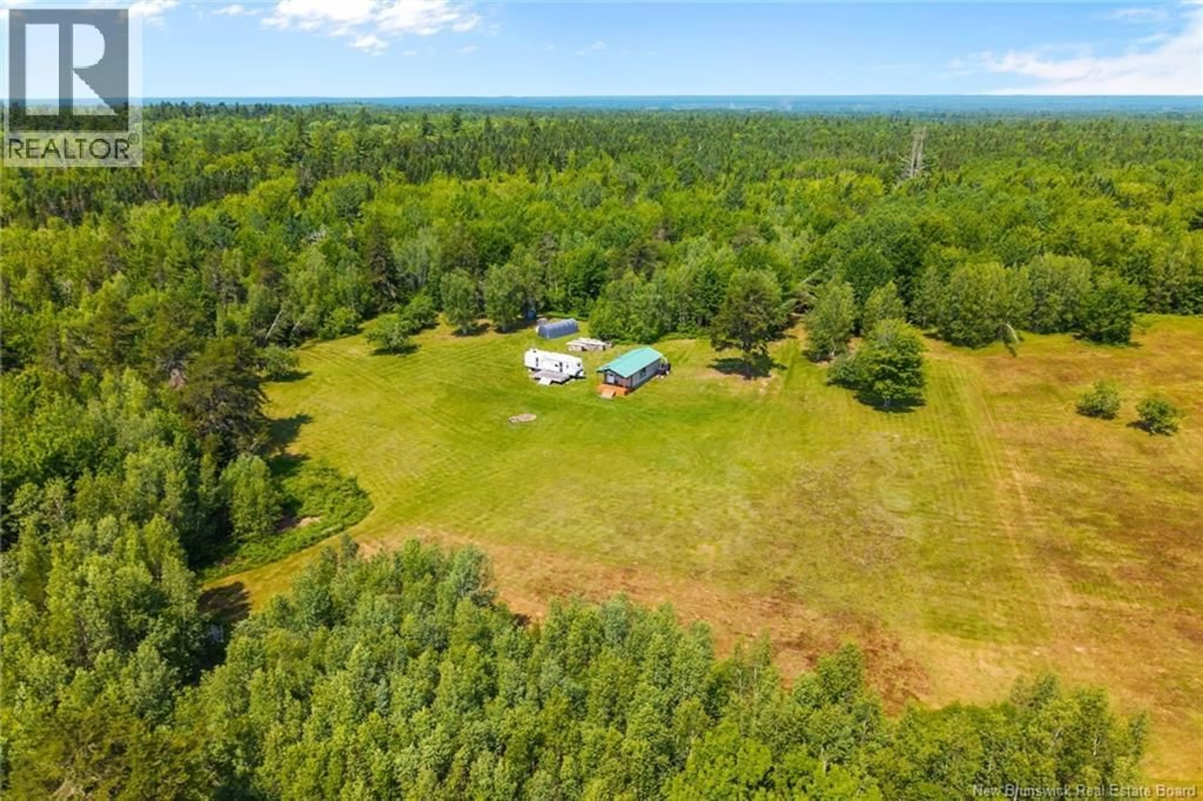 A pic from outside/outdoor area/front of a property/back of a property/a pic from drone, water/lake/river/ocean view for Camp/Lot DUFFERIN ROAD, Chipman New Brunswick O0O0O0