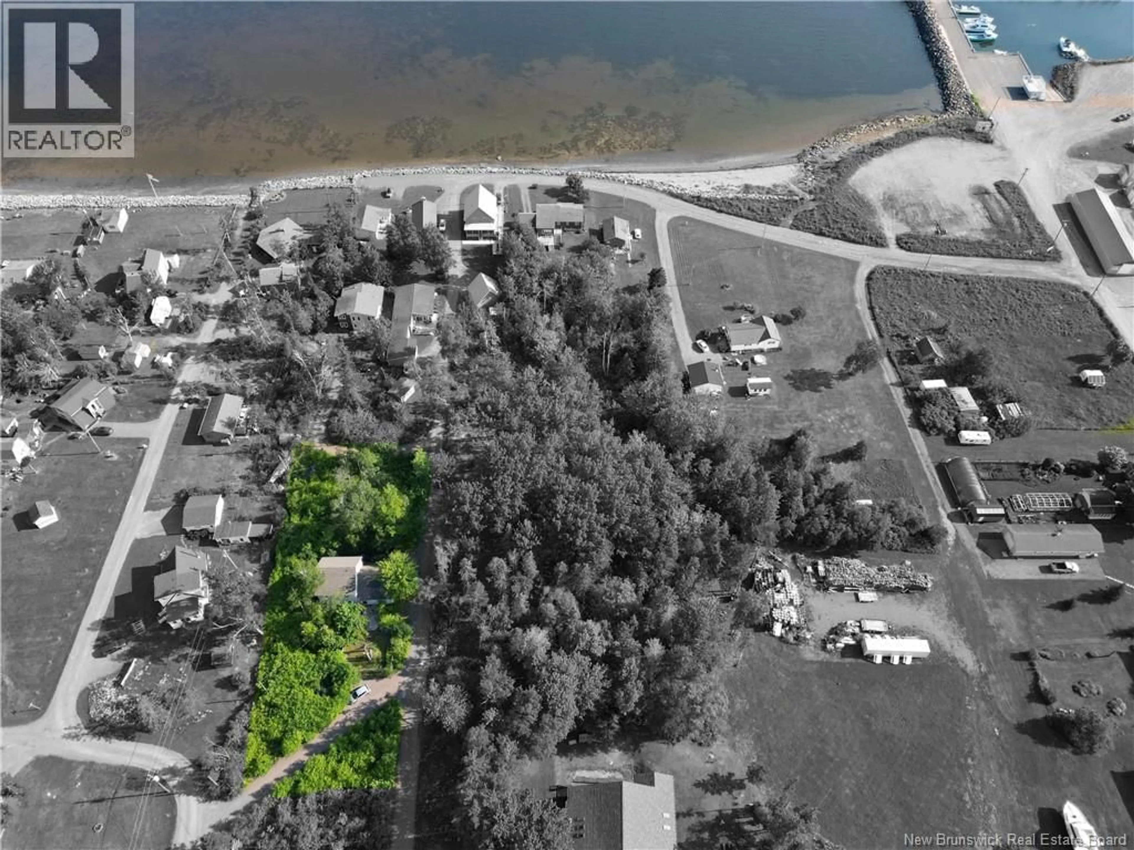 A pic from outside/outdoor area/front of a property/back of a property/a pic from drone, water/lake/river/ocean view for 19 CHEMIN DU PETIT BOIS, Grand-Barachois New Brunswick E4P7K4