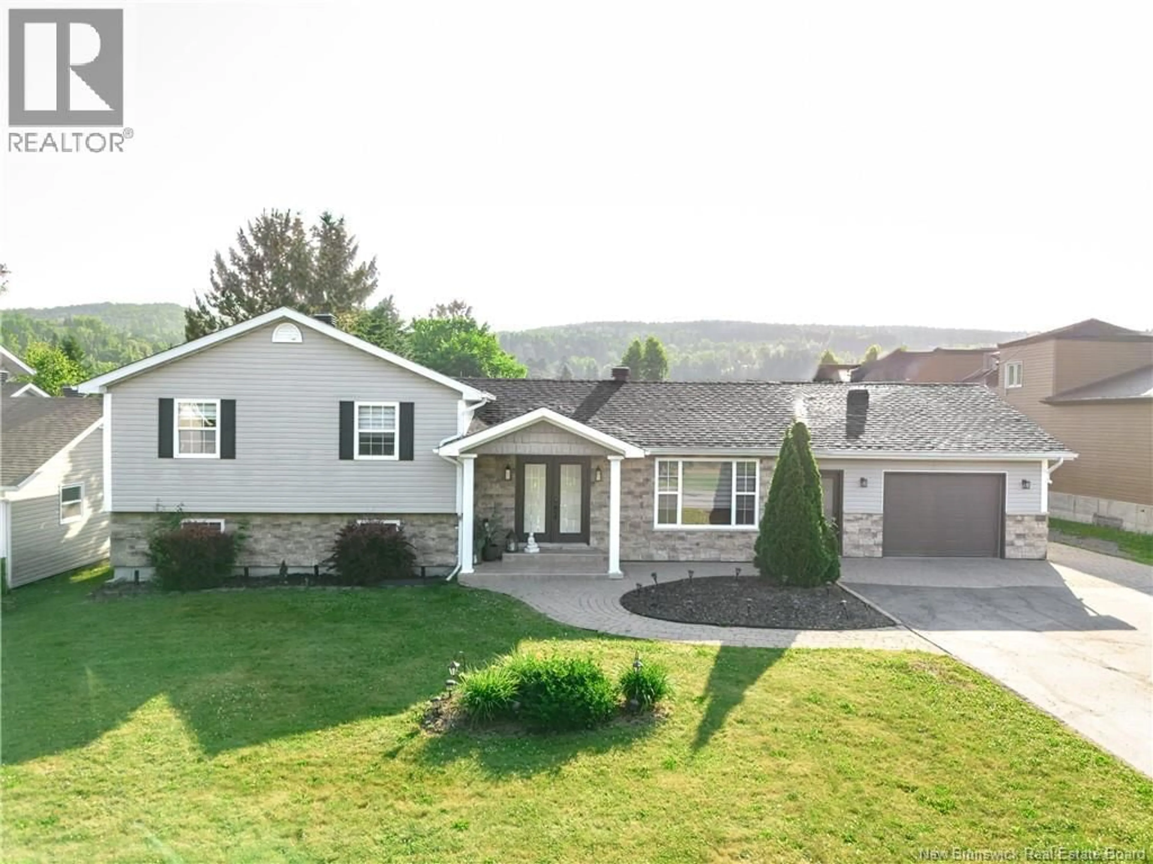 Home with vinyl exterior material, mountain view for 8 BELONE STREET, Edmundston New Brunswick E7B1B6