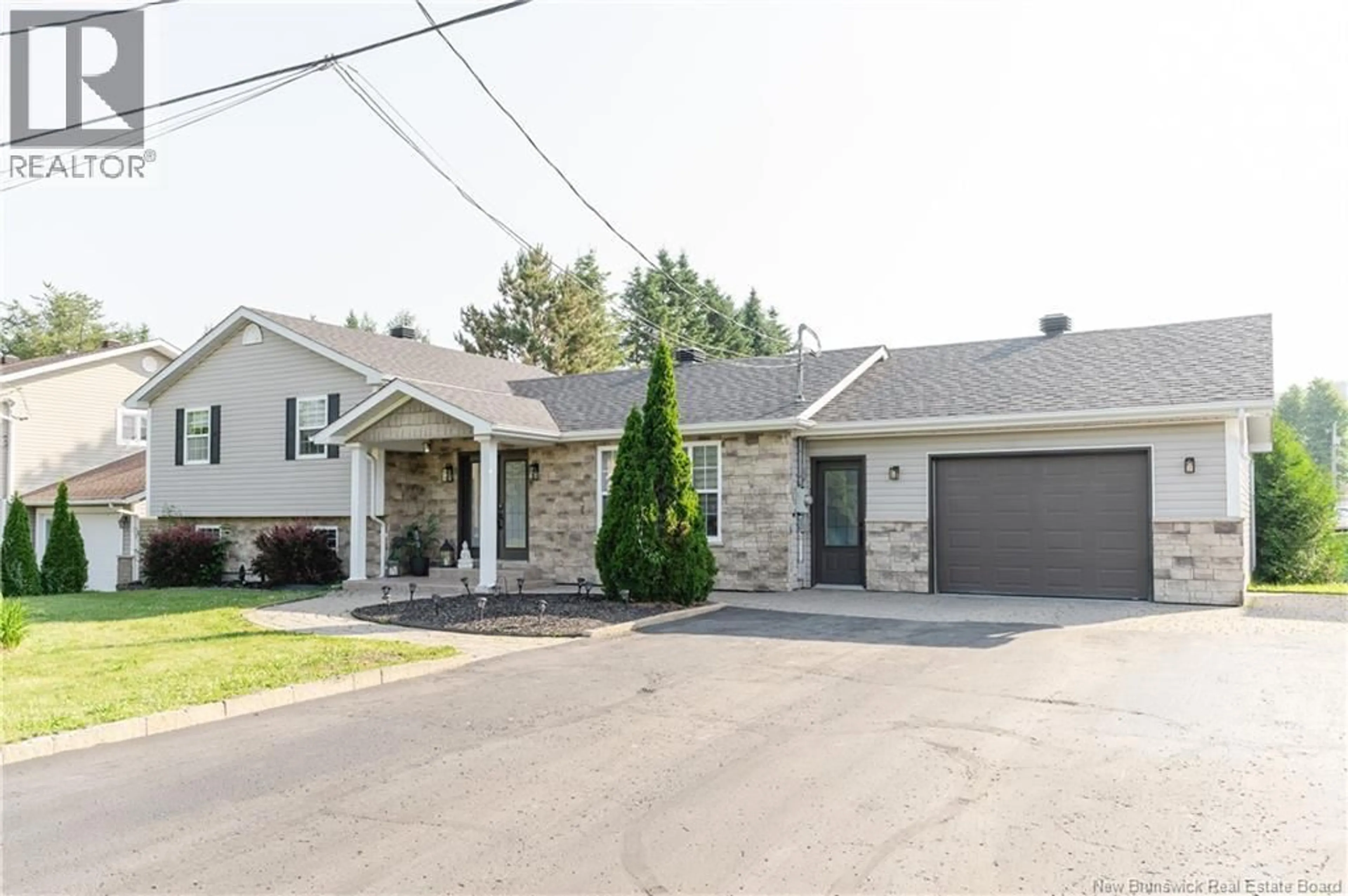 Home with brick exterior material, street for 8 BELONE STREET, Edmundston New Brunswick E7B1B6