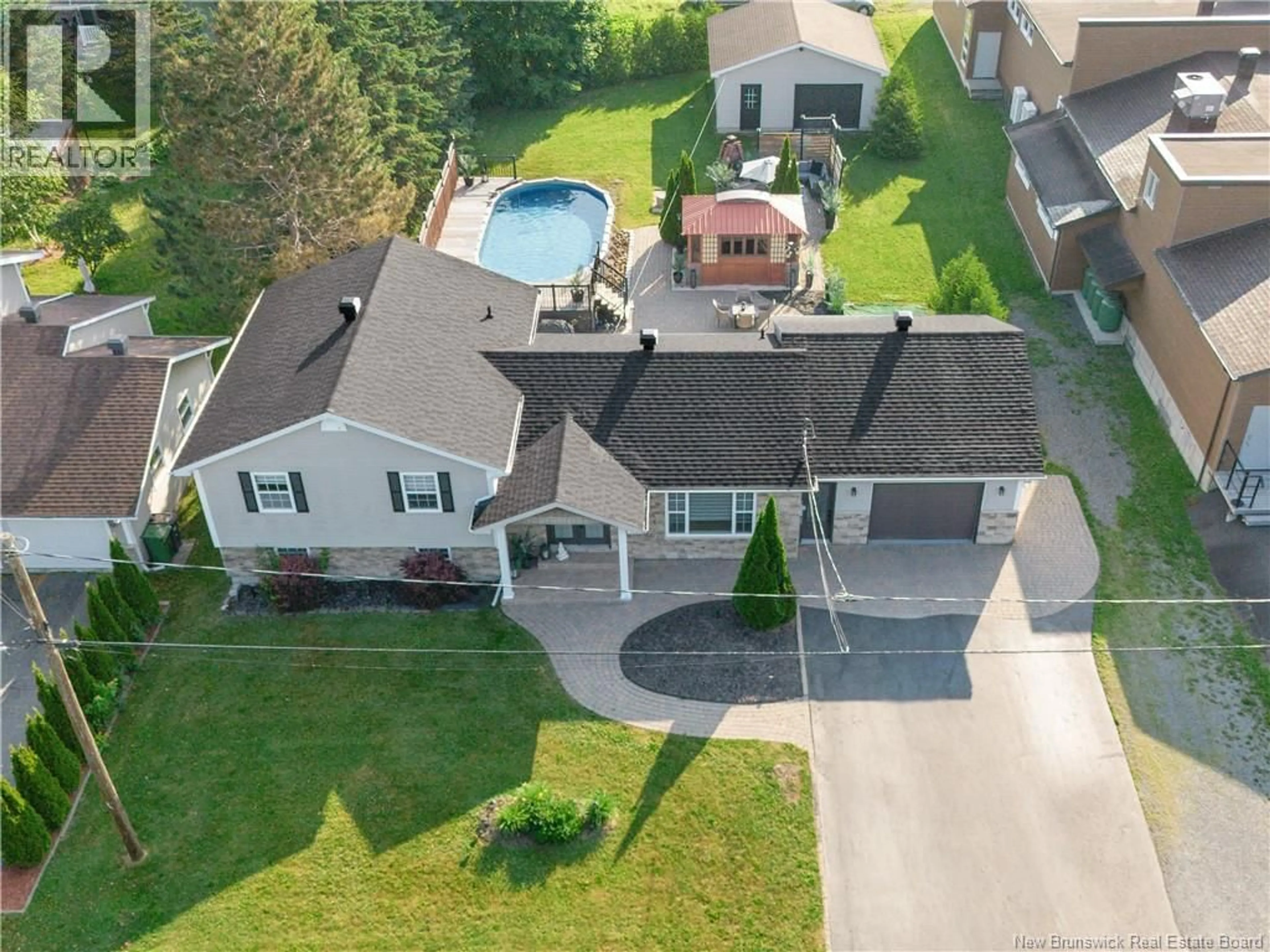 A pic from outside/outdoor area/front of a property/back of a property/a pic from drone, unknown for 8 BELONE STREET, Edmundston New Brunswick E7B1B6