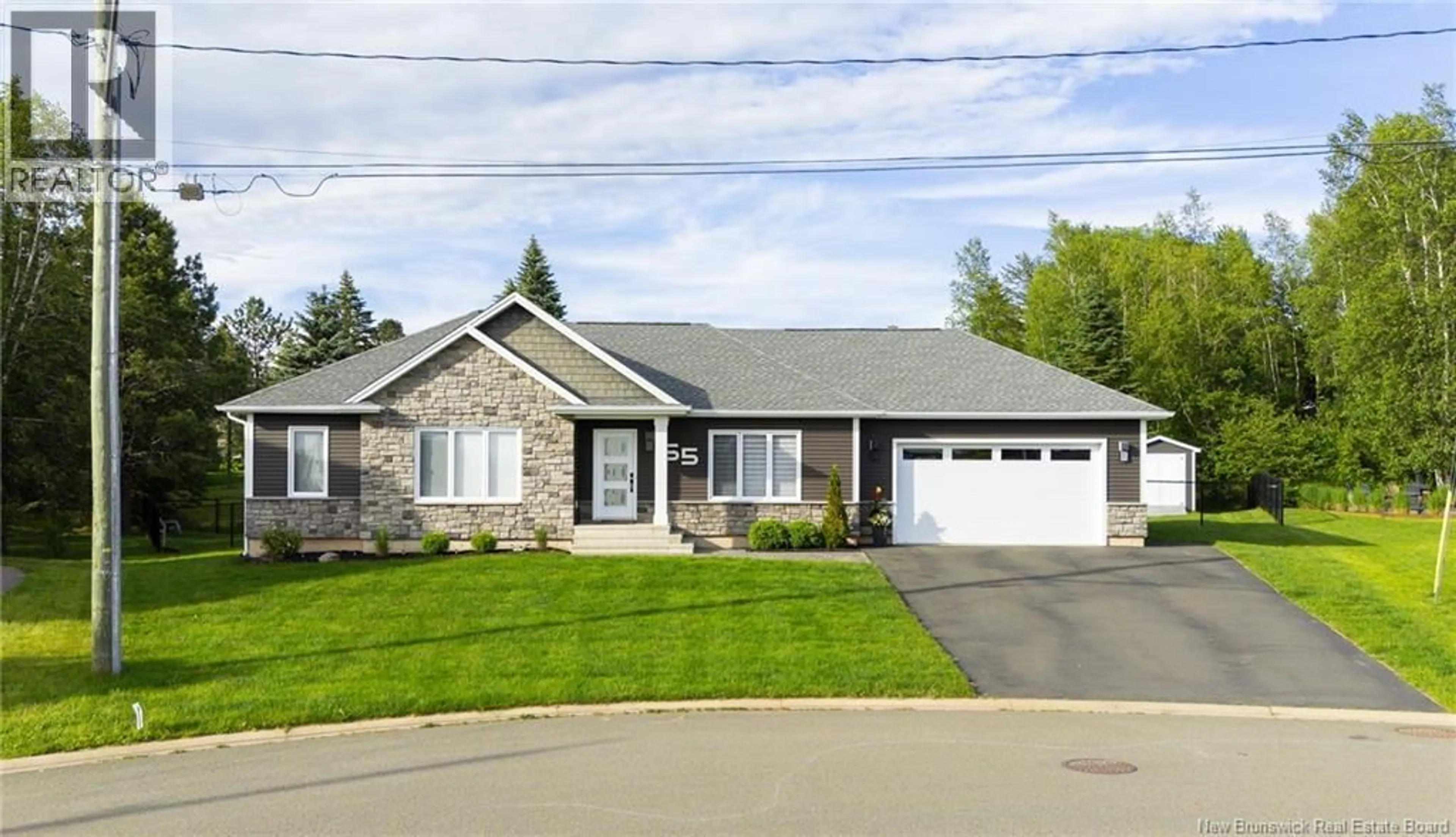 Home with vinyl exterior material, street for 65 ABOITEAU, Dieppe New Brunswick E1A8Z8
