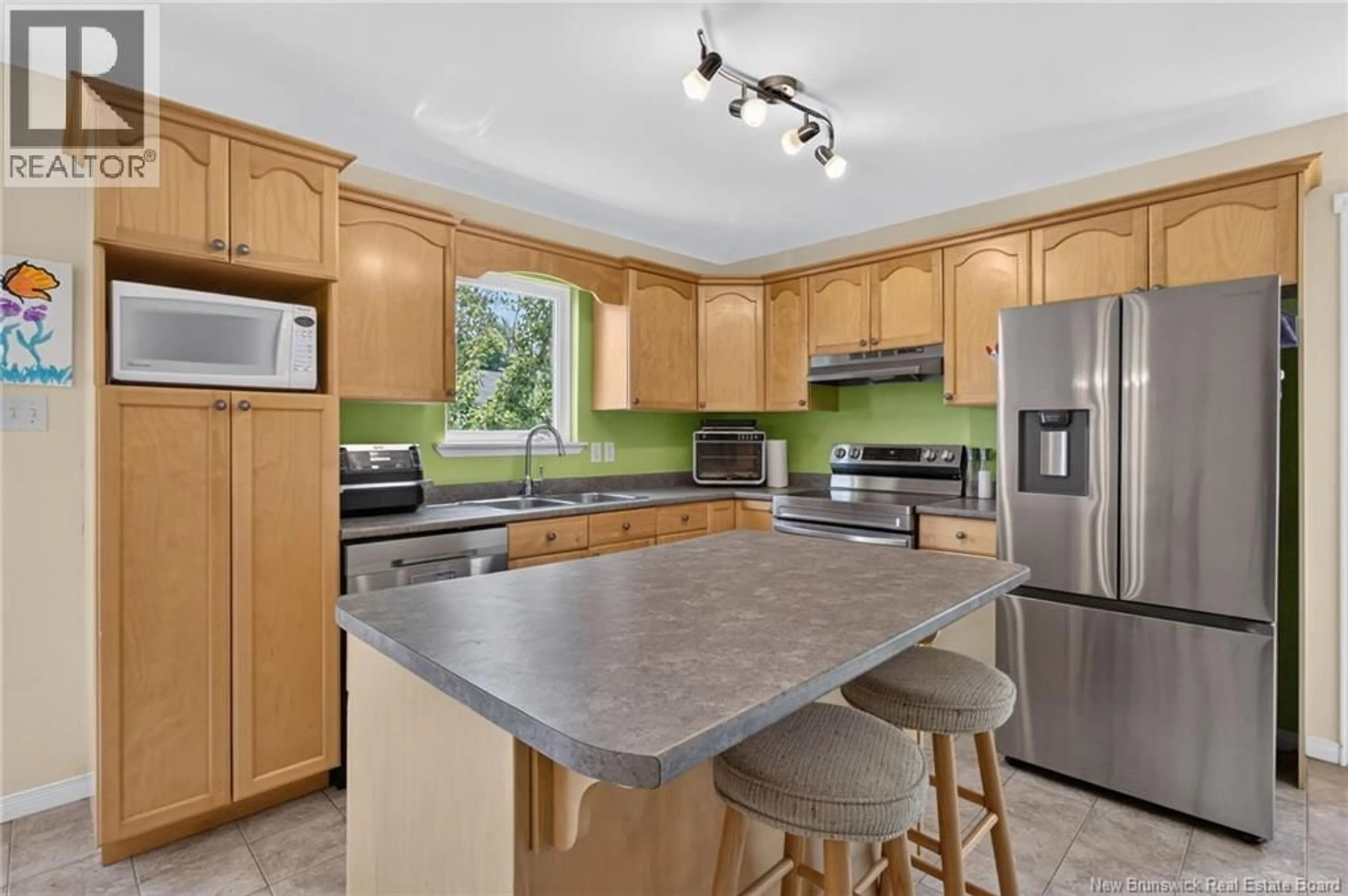 Open concept kitchen, ceramic/tile floor for 24 STONEHAM, Moncton New Brunswick E1G4Z6