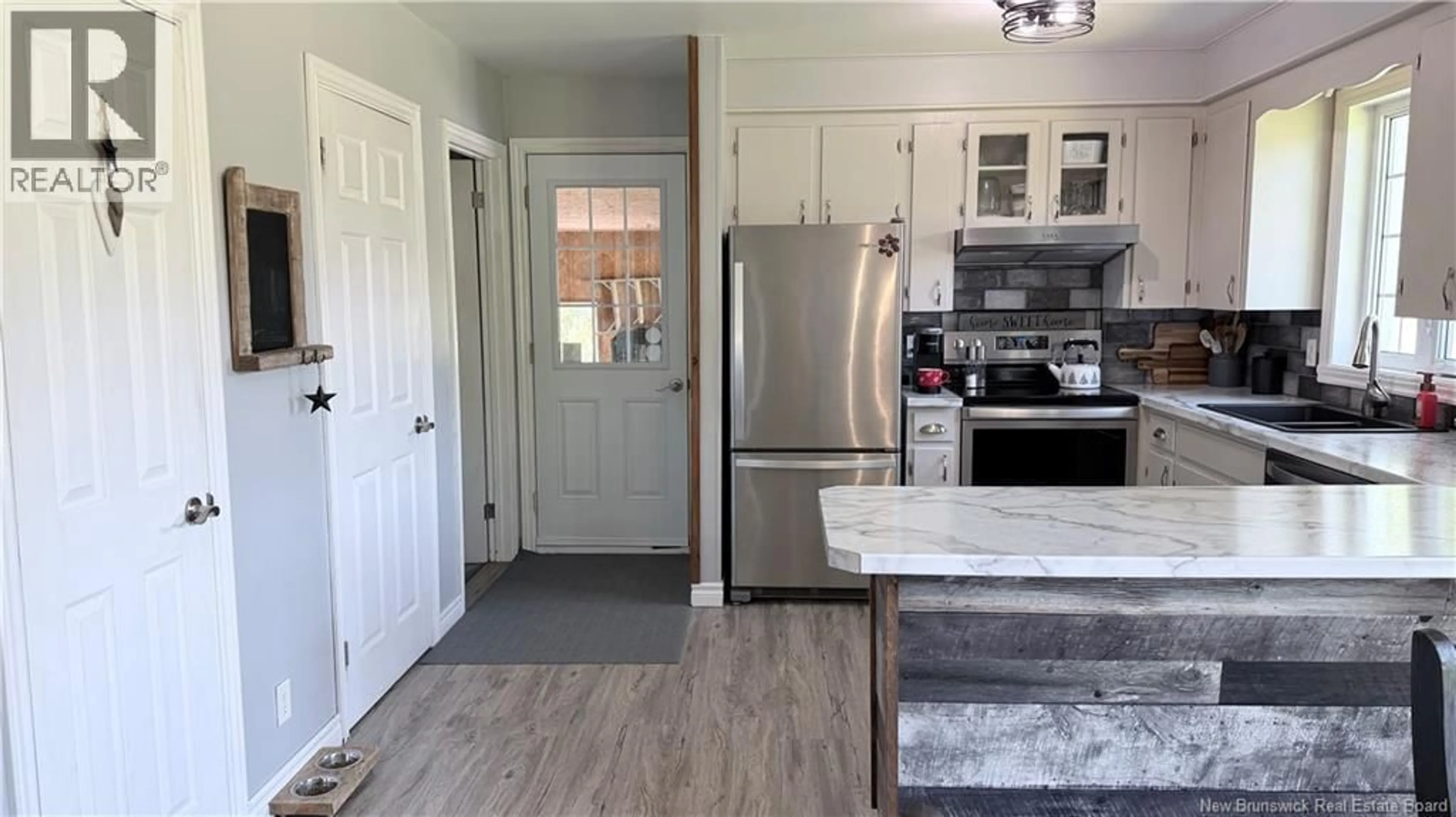 Open concept kitchen, ceramic/tile floor for 35 MICHAUD STREET, Grand Falls New Brunswick E3Z1L5