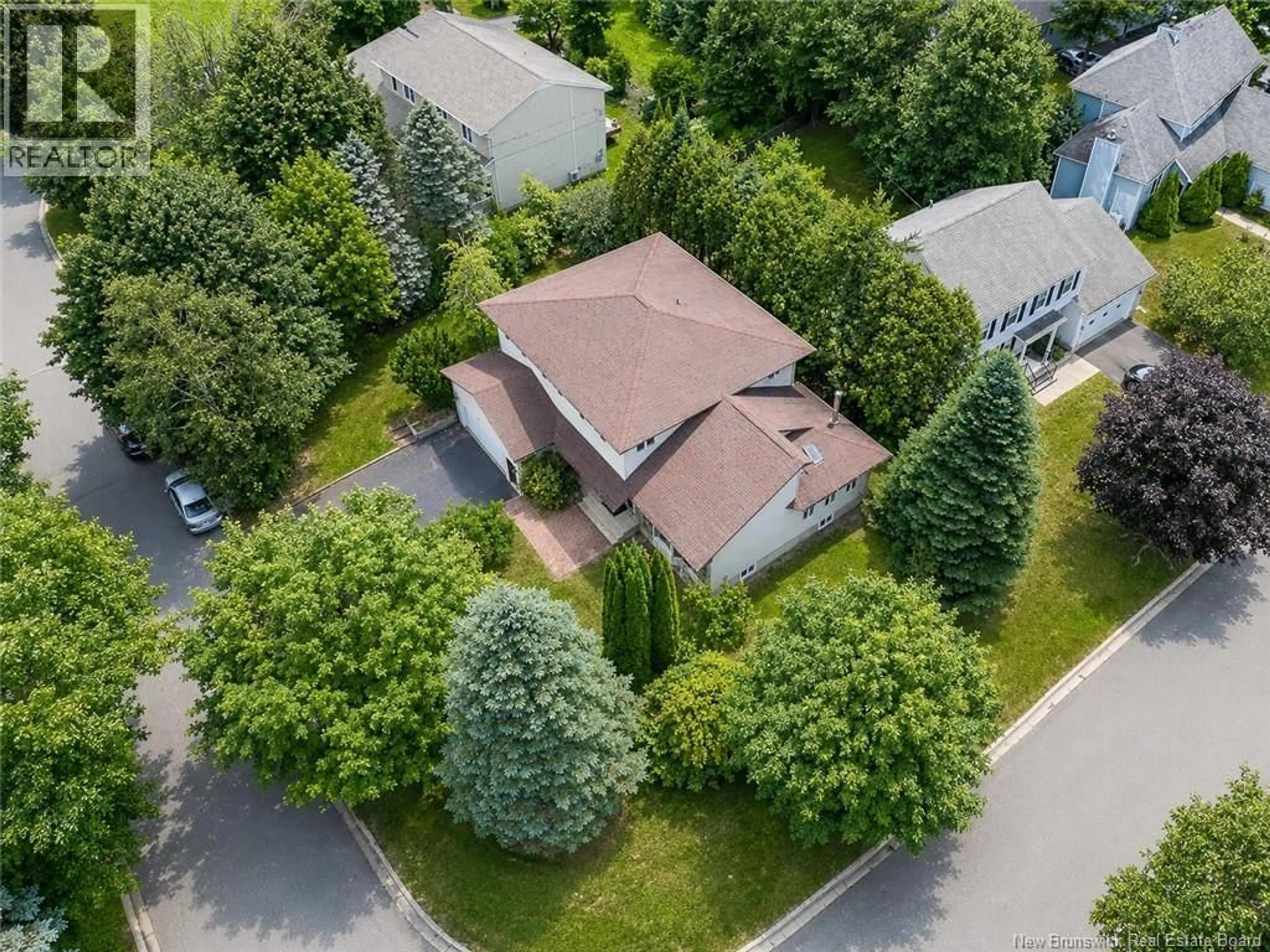 A pic from outside/outdoor area/front of a property/back of a property/a pic from drone, street for 11 BAXTER COURT, Fredericton New Brunswick E3B6M2