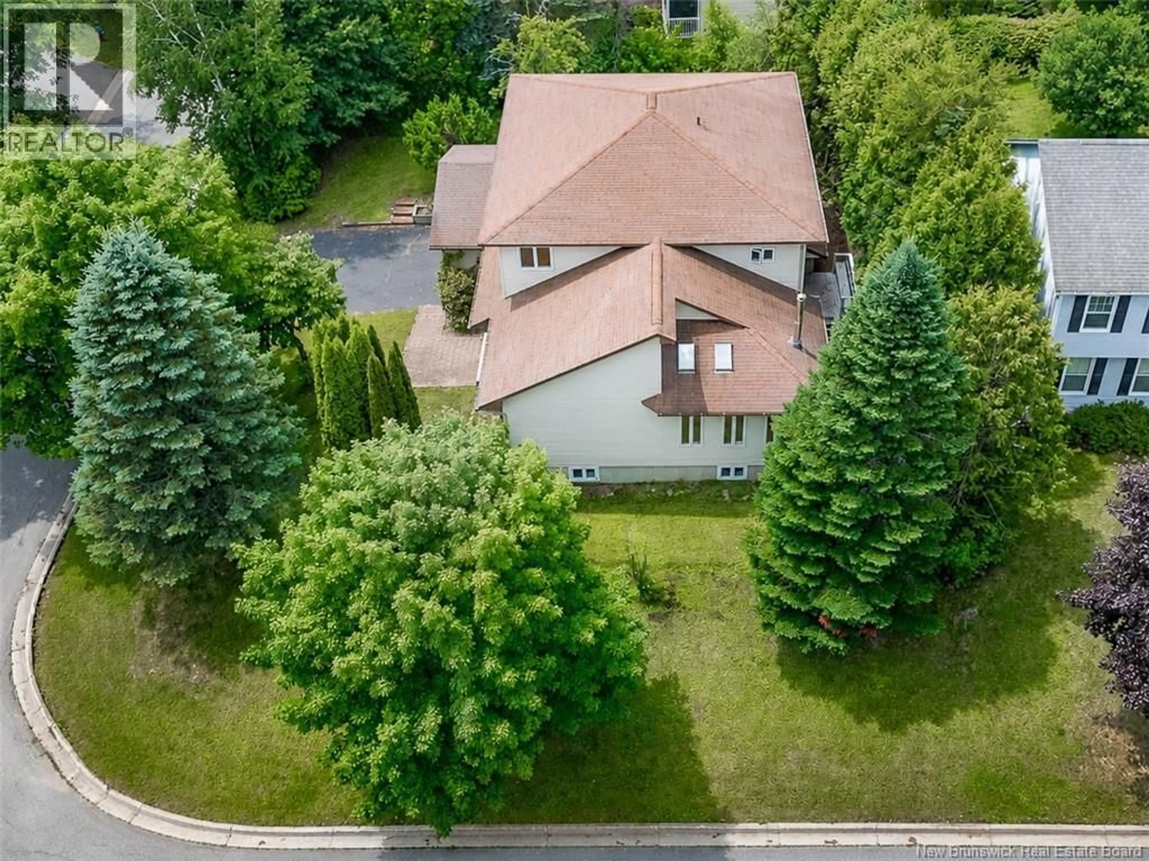 A pic from outside/outdoor area/front of a property/back of a property/a pic from drone, street for 11 BAXTER COURT, Fredericton New Brunswick E3B6M2