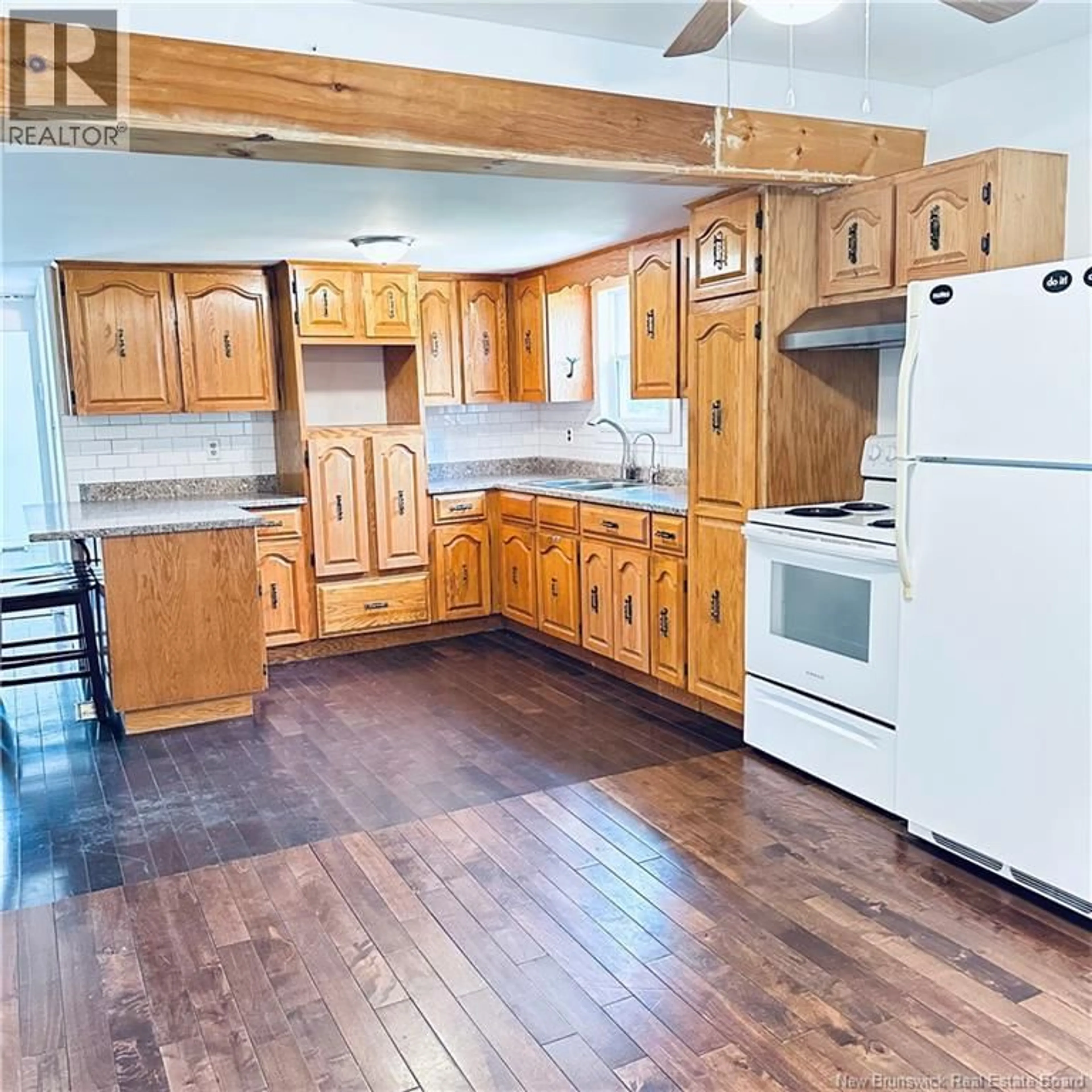 Open concept kitchen, wood/laminate floor for 510 PLEASANT RIDGE, Rogersville New Brunswick E4Y1C4