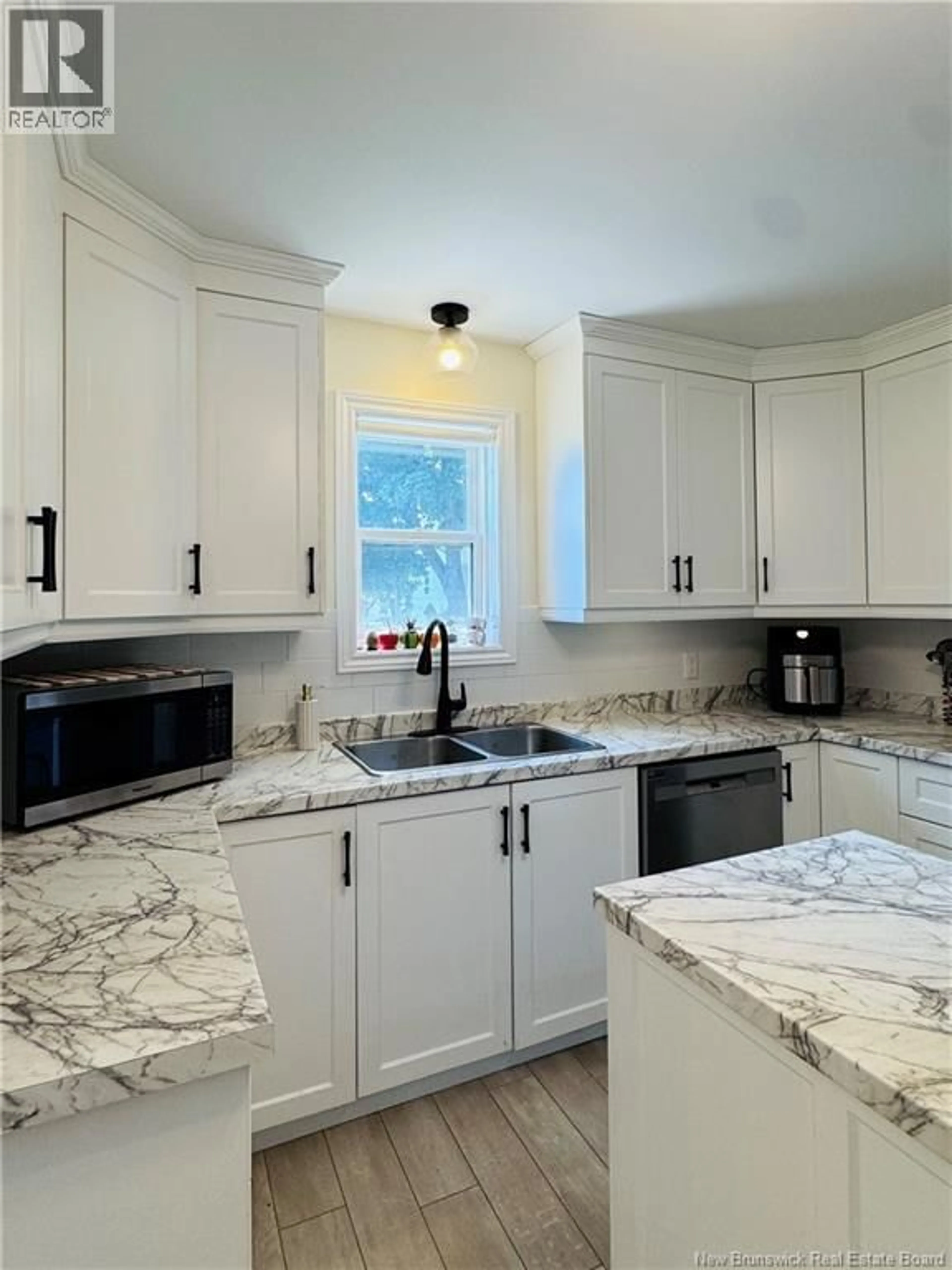 Open concept kitchen, ceramic/tile floor for 240 ALEXANDER STREET, Miramichi New Brunswick E1V1H3