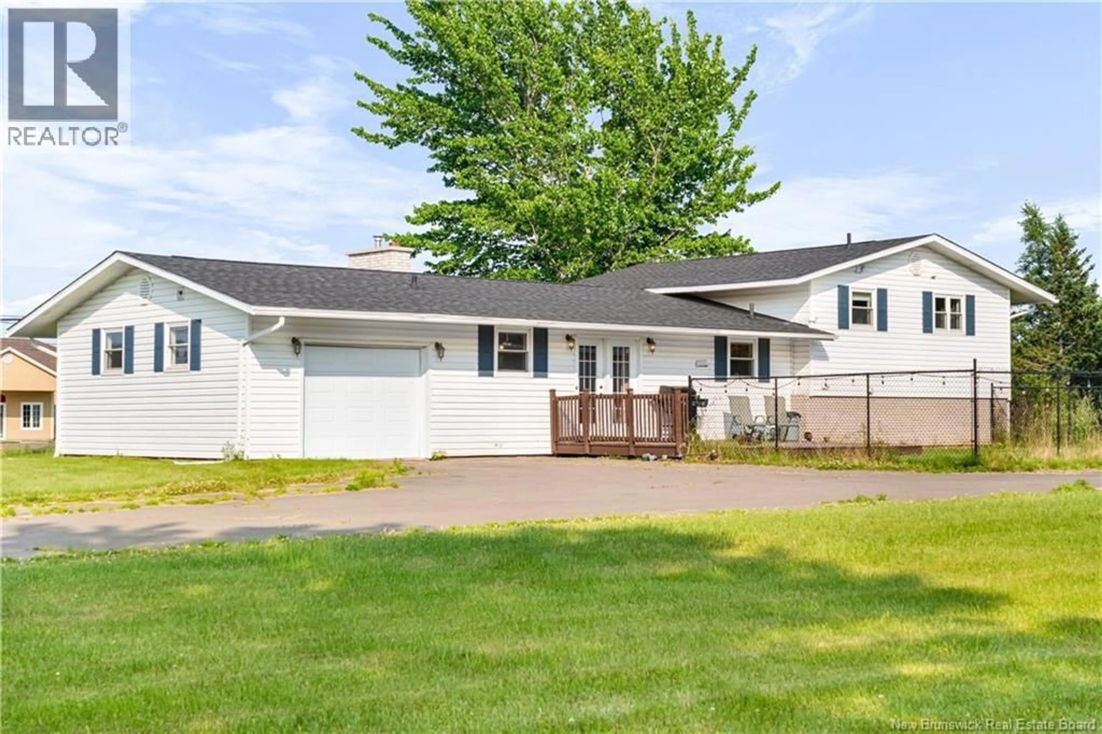 Home with vinyl exterior material, street for 104 EVANGELINE STREET, Bouctouche New Brunswick E4S3E5
