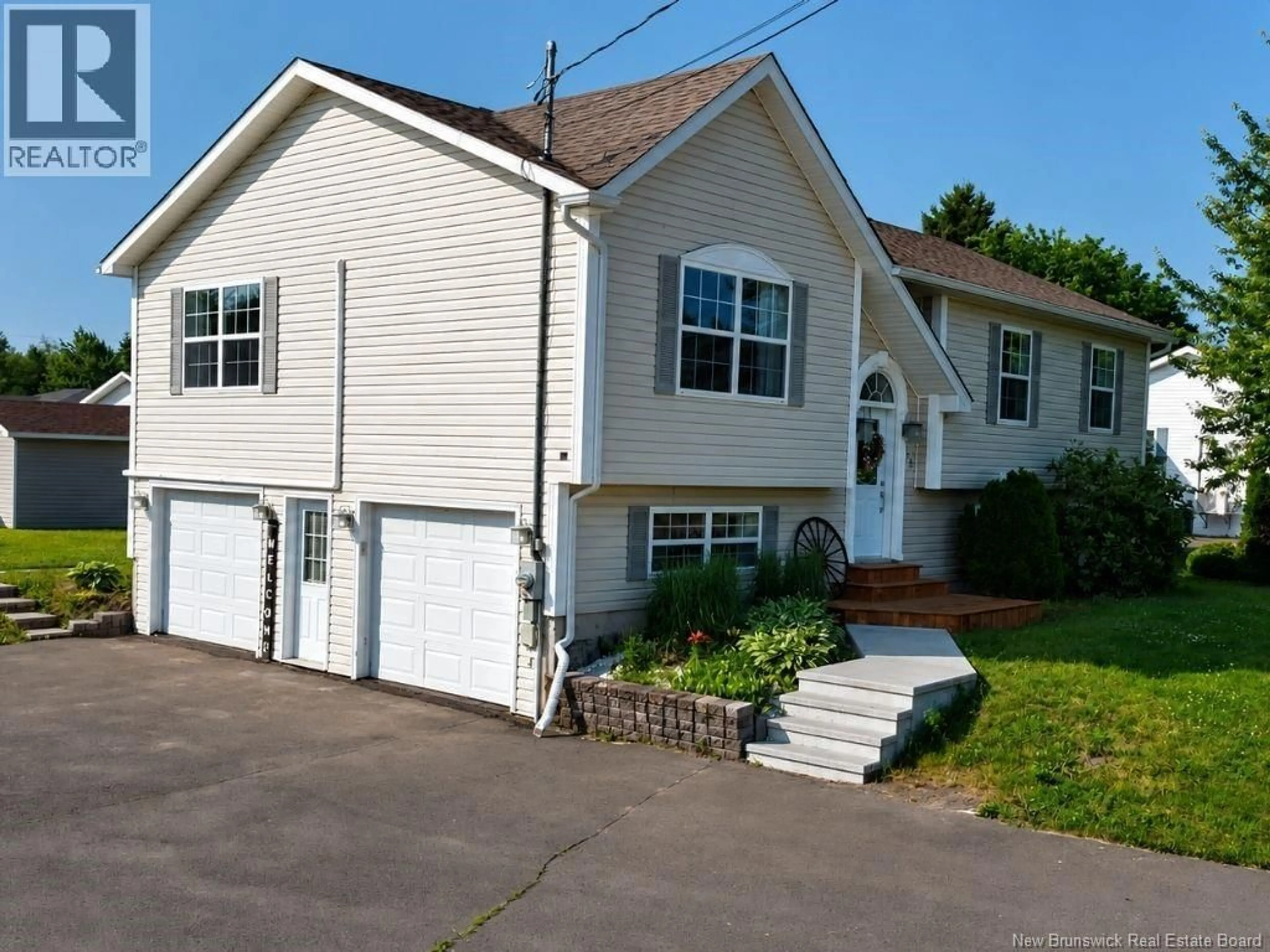 Home with vinyl exterior material, street for 15 GEORGE RUELLE, Bouctouche New Brunswick E4S3E9